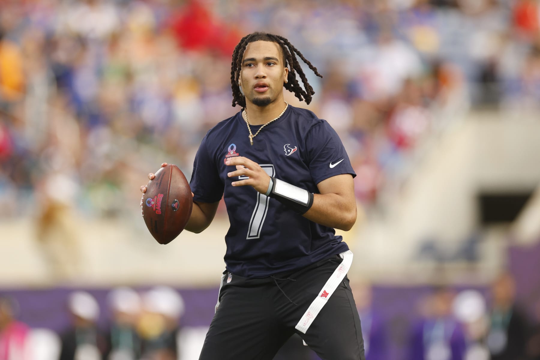 ORLANDO, FLORIDA - FEBRUARY 04: C.J. Stroud #7 of the Houston Texans and AFC looks to throw the ball during the 2024 NFL Pro Bowl Games at Camping World Stadium on February 04, 2024 in Orlando, Florida. (Photo by Mike Ehrmann/Getty Images)