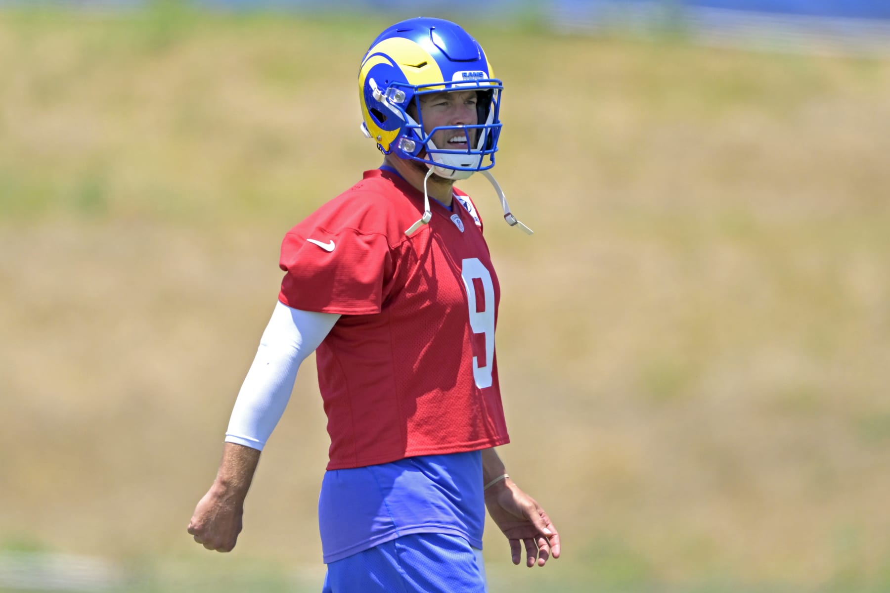 THOUSAND OAKS, CALIFORNIA - MAY 21: Quarterback Matthew Stafford #9 of the Los Angeles Rams participates in drills during OTAs on May 21, 2024 at Cal Lutheran University in Thousand Oaks, California. (Photo by Jayne Kamin-Oncea/Getty Images)