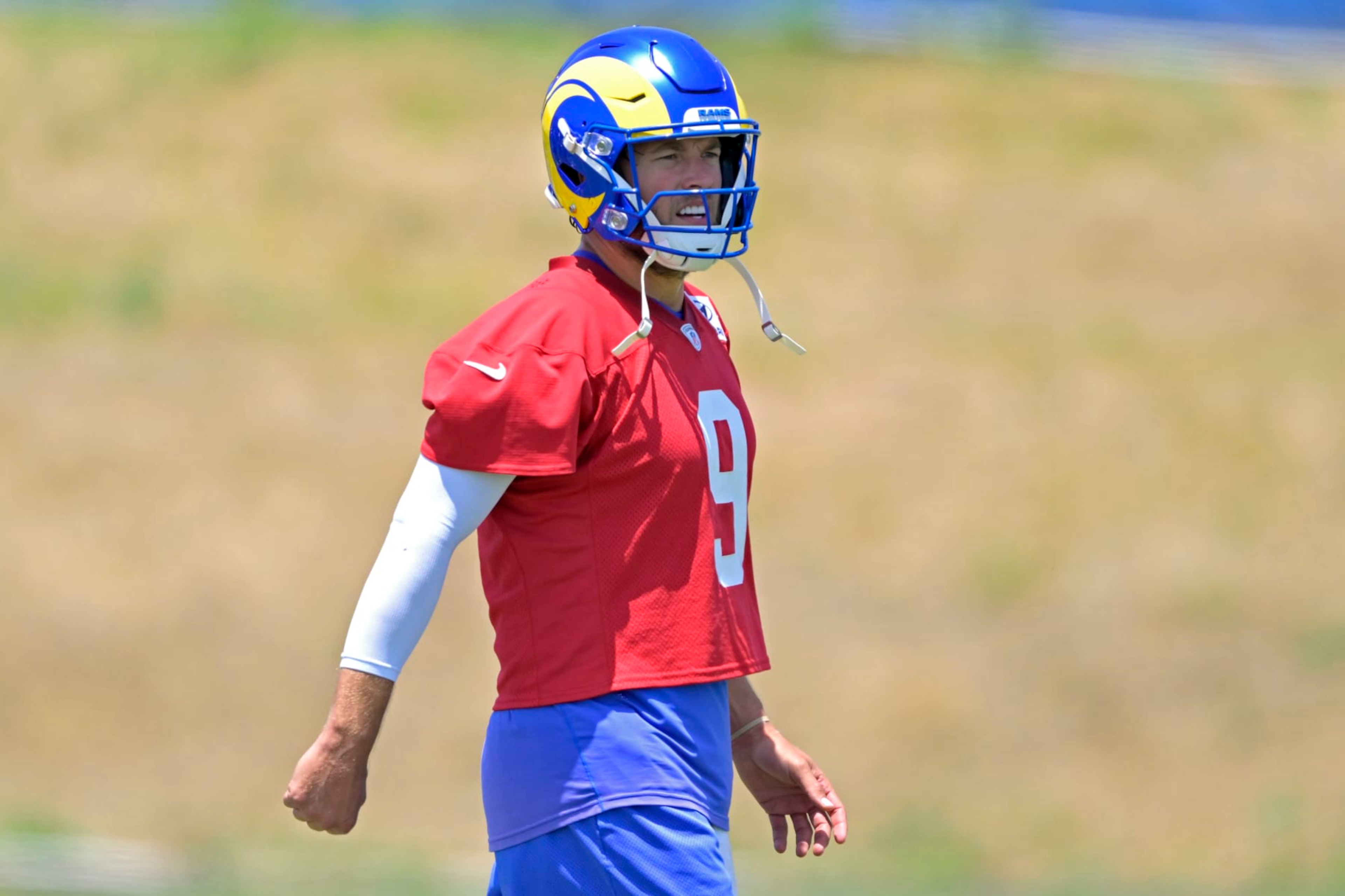 THOUSAND OAKS, CALIFORNIA - MAY 21: Quarterback Matthew Stafford #9 of the Los Angeles Rams participates in drills during OTAs on May 21, 2024 at Cal Lutheran University in Thousand Oaks, California. (Photo by Jayne Kamin-Oncea/Getty Images)