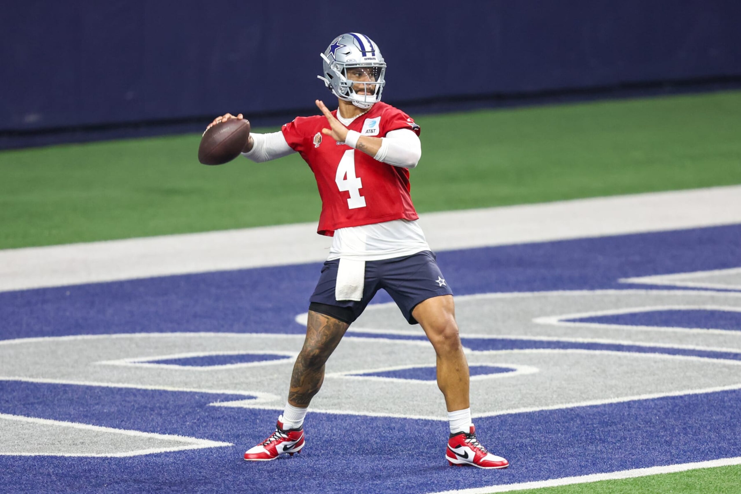 FRISCO, TX - MAY 22: Dallas Cowboys quarterback Dak Prescott (4) passes during the Dallas Cowboys OTAs on May 22, 2024 at The Star in Frisco, TX. (Photo by George Walker/Icon Sportswire via Getty Images) FRISCO, TX - MAY 22: Dallas Cowboys quarterback Dak Prescott (4) passes during the Dallas Cowboys OTAs on May 22, 2024 at The Star in Frisco, TX. (Photo by George Walker/Icon Sportswire via Getty Images)
