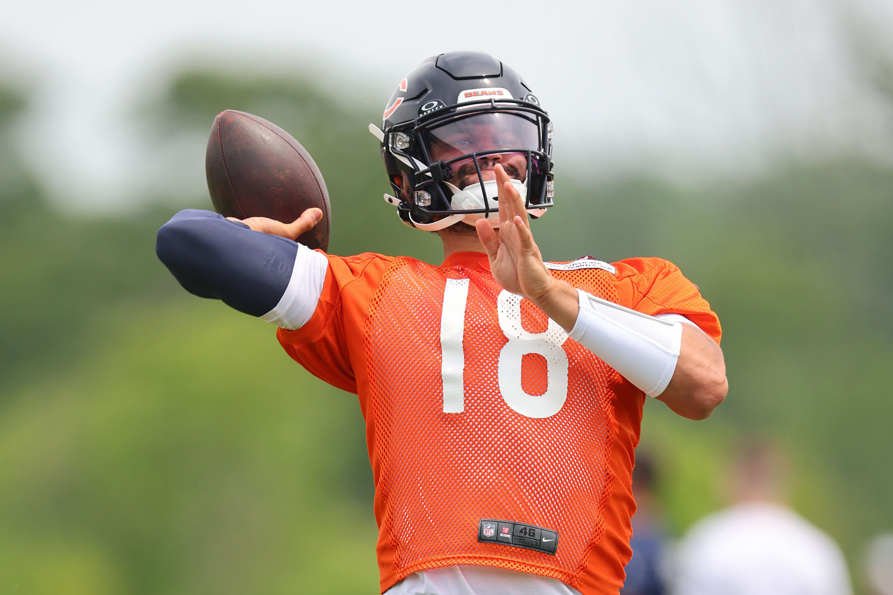 LAKE FOREST, ILLINOIS - JUNE 04: Caleb Williams #18 of the Chicago Bears throws a pass during Chicago Bears Minicamp at Halas Hall on June 04, 2024 in Lake Forest, Illinois. (Photo by Michael Reaves/Getty Images)
