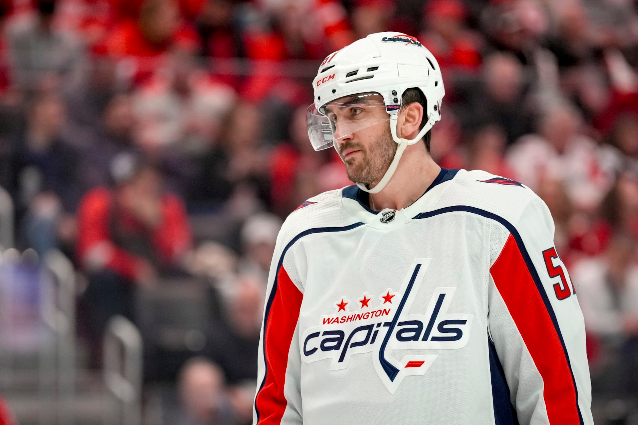 DETROIT, MICHIGAN - APRIL 09: Trevor van Riemsdyk #57 of the Washington Capitals looks on against the Detroit Red Wings at Little Caesars Arena on April 09, 2024 in Detroit, Michigan. (Photo by Nic Antaya/Getty Images)