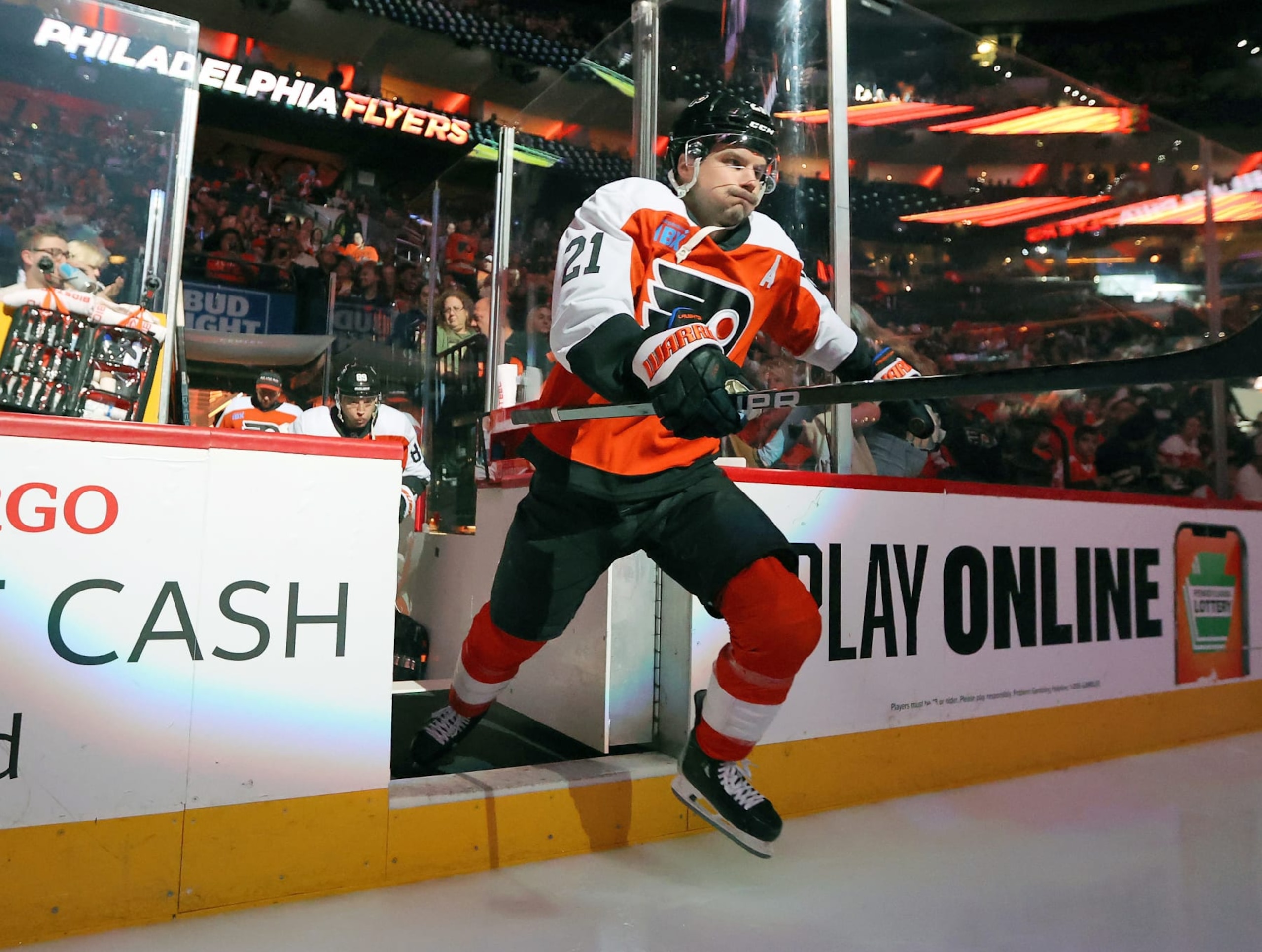 PHILADELPHIA, PENNSYLVANIA - APRIL 16:  Scott Laughton #21 of the Philadelphia Flyers enters the ice surface prior to the start of his game against the Washington Capitals at the Wells Fargo Center on April 16, 2024 in Philadelphia, Pennsylvania.  (Photo by Len Redkoles/NHLI via Getty Images)