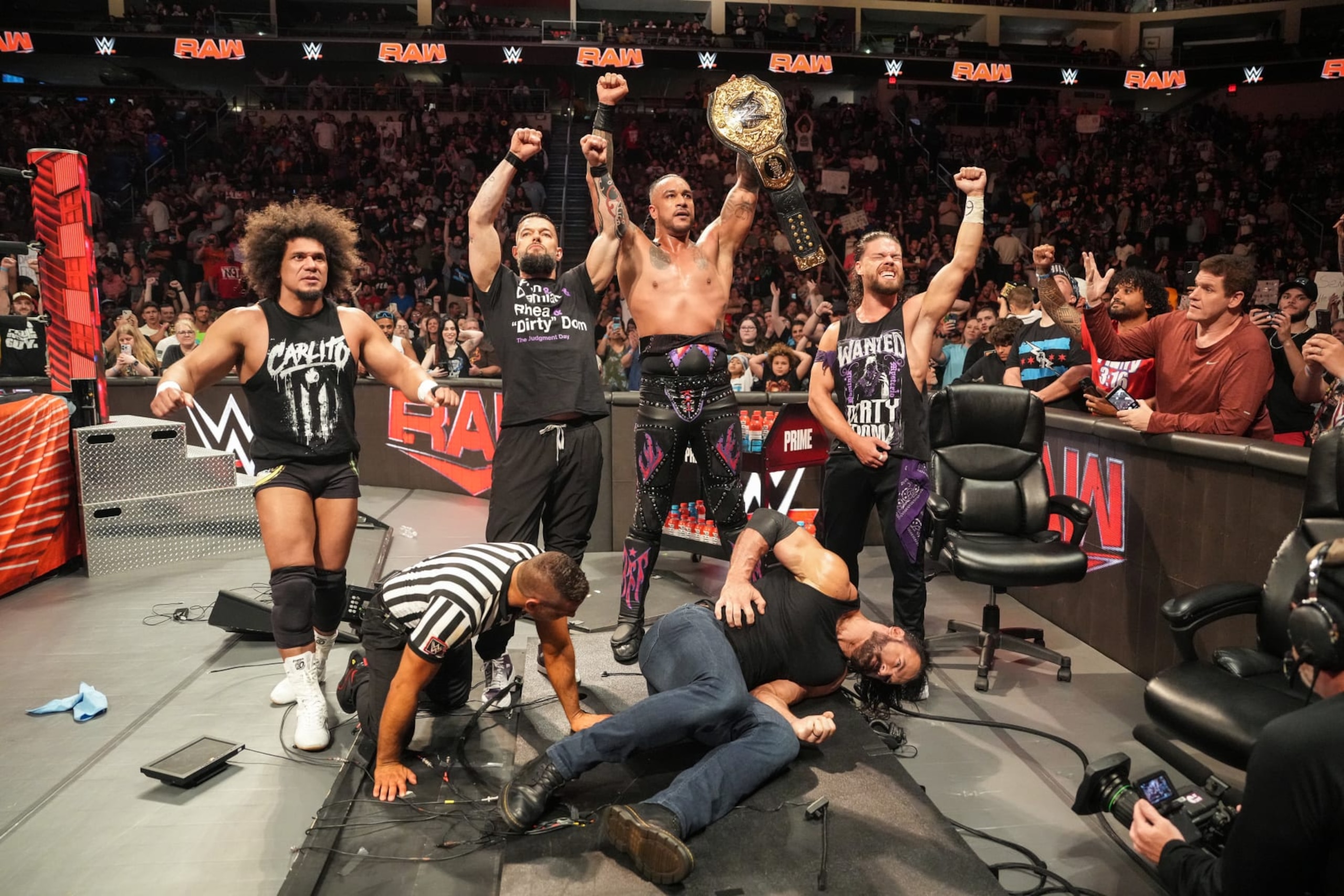 HERSHEY, PENNSYLVANIA - JUNE 03: Judgment Day celebrates Damian Priest's win during Monday Night RAW at Giant Center on June 3, 2024 in Hershey, Pennsylvania.  (Photo by WWE/Getty Images)