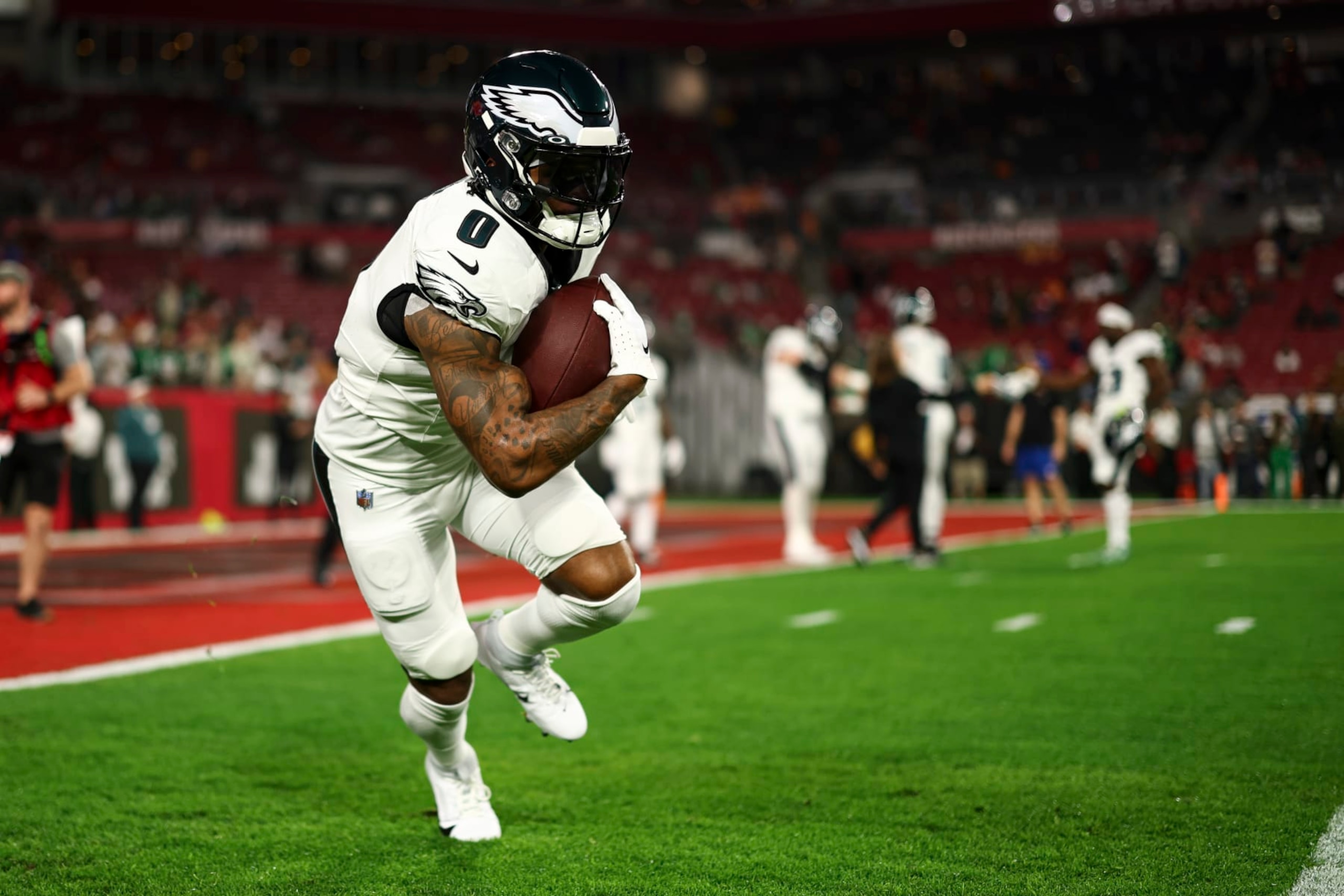 TAMPA, FL - JANUARY 15: D'Andre Swift #0 of the Philadelphia Eagles warms up prior to an NFL wild-card playoff football game against the Tampa Bay Buccaneers at Raymond James Stadium on January 15, 2024 in Tampa, Florida. (Photo by Kevin Sabitus/Getty Images)