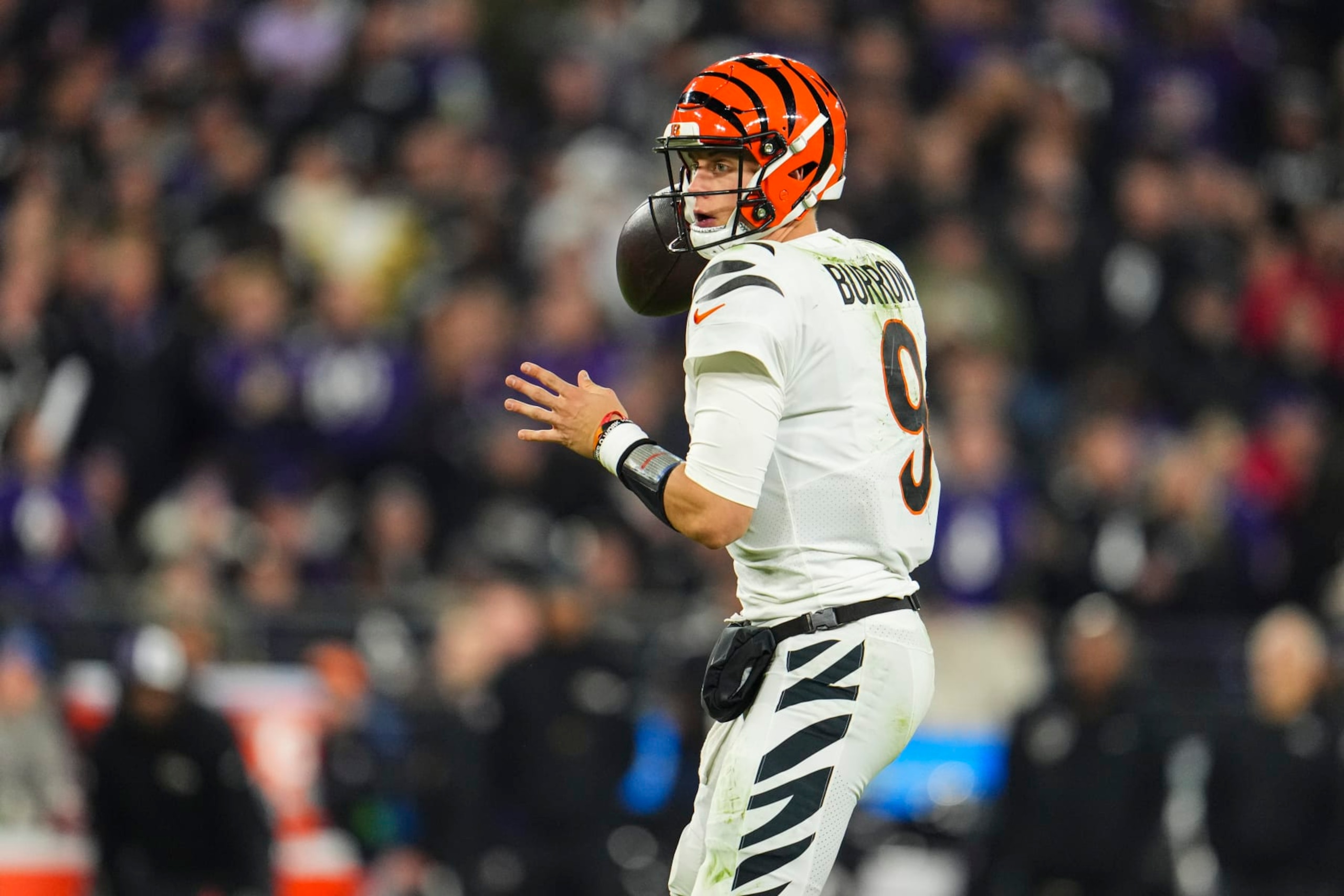 BALTIMORE, MD - NOVEMBER 16: Joe Burrow #9 of the Cincinnati Bengals throws the ball during an NFL football game against the Baltimore Ravens at M&T Bank Stadium on November 16, 2023 in Baltimore, Maryland. (Photo by Cooper Neill/Getty Images)