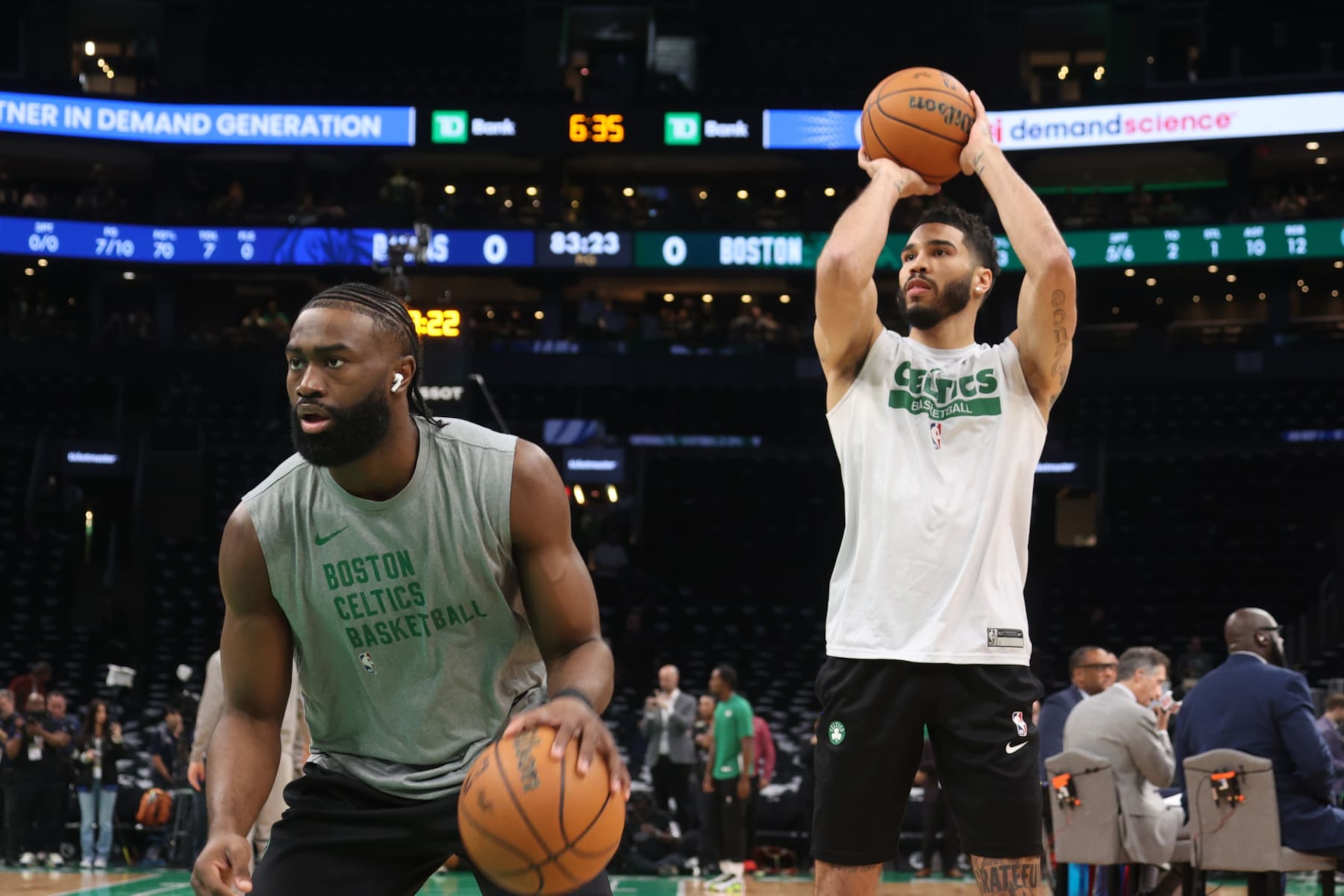 BOSTON, MA - JUNE 9: Jaylen Brown #7 and Jayson Tatum #0 of the Boston Celtics warm up before the game against the Dallas Mavericks during Game 1 of the 2024 NBA Finals on June 9, 2024 at the TD Garden in Boston, Massachusetts. NOTE TO USER: User expressly acknowledges and agrees that, by downloading and or using this photograph, User is consenting to the terms and conditions of the Getty Images License Agreement. Mandatory Copyright Notice: Copyright 2024 NBAE  (Photo by David L. Nemec/NBAE via Getty Images)