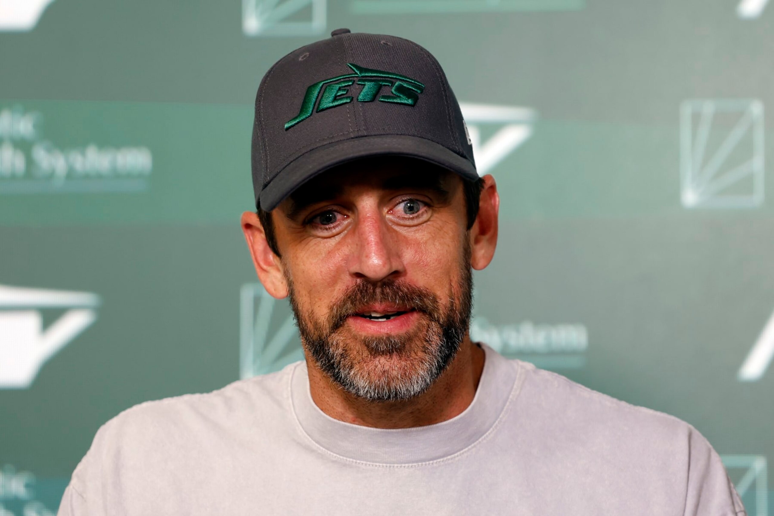 FLORHAM PARK, NEW JERSEY - MAY 21: Aaron Rodgers #8 of the New York Jets speaks to the media during the New York Jets OTA Offseason Workout at Atlantic Health Jets Training Center on May 21, 2024 in Florham Park, New Jersey. (Photo by Sarah Stier/Getty Images) FLORHAM PARK, NEW JERSEY - MAY 21: Aaron Rodgers #8 of the New York Jets speaks to the media during the New York Jets OTA Offseason Workout at Atlantic Health Jets Training Center on May 21, 2024 in Florham Park, New Jersey. (Photo by Sarah Stier/Getty Images)