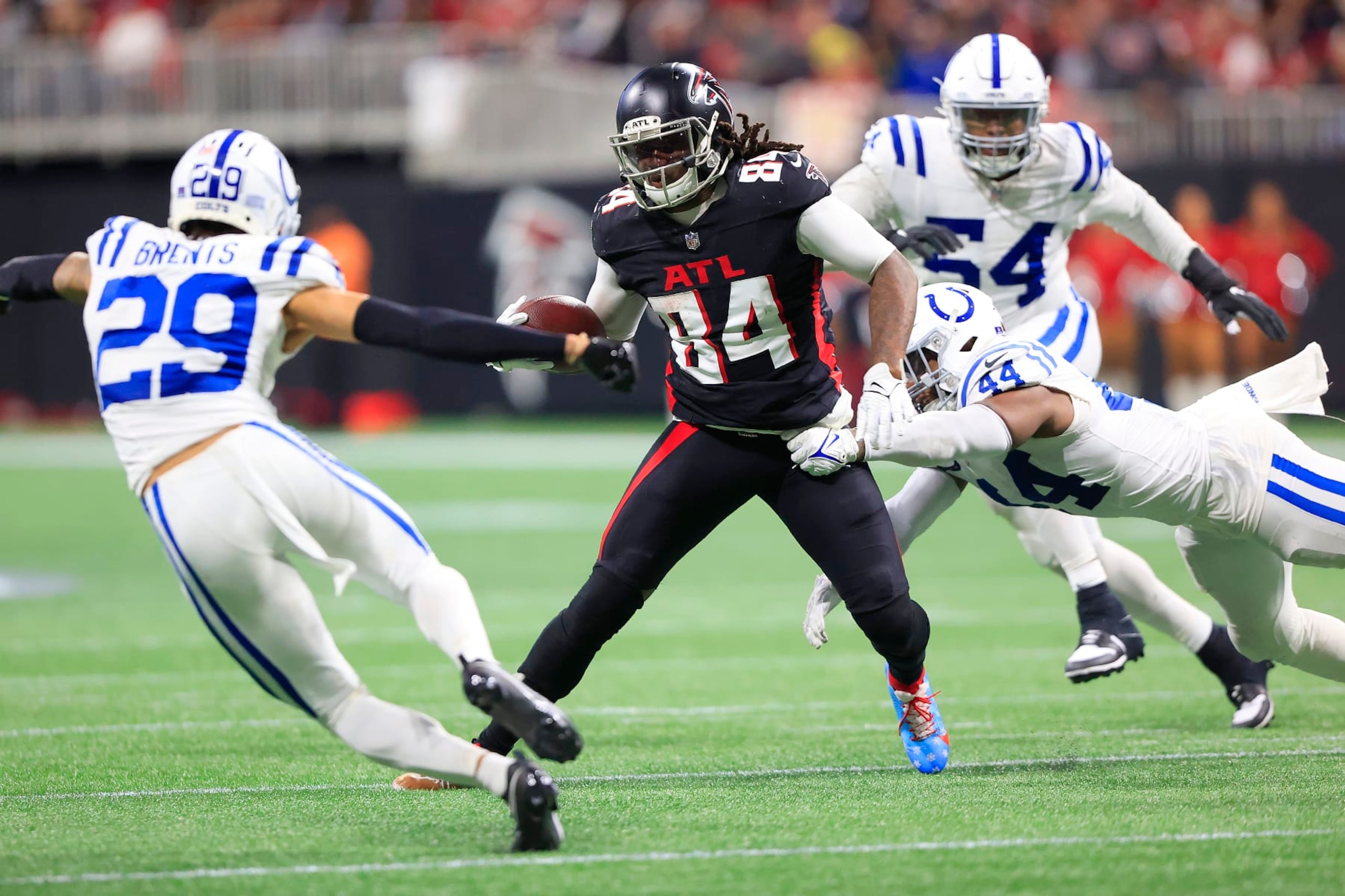 ATLANTA, GA - DECEMBER 24:  Indianapolis Colts linebacker Zaire Franklin (44) attempts to tackle Atlanta Falcons running back Cordarrelle Patterson (84) during the Christmas Eve NFL football game between the Atlanta Falcons and the Indianapolis Colts on December 24, 2023 at the Mercedes-Benz Stadium in Atlanta, Georgia.  (Photo by David J. Griffin/Icon Sportswire via Getty Images)