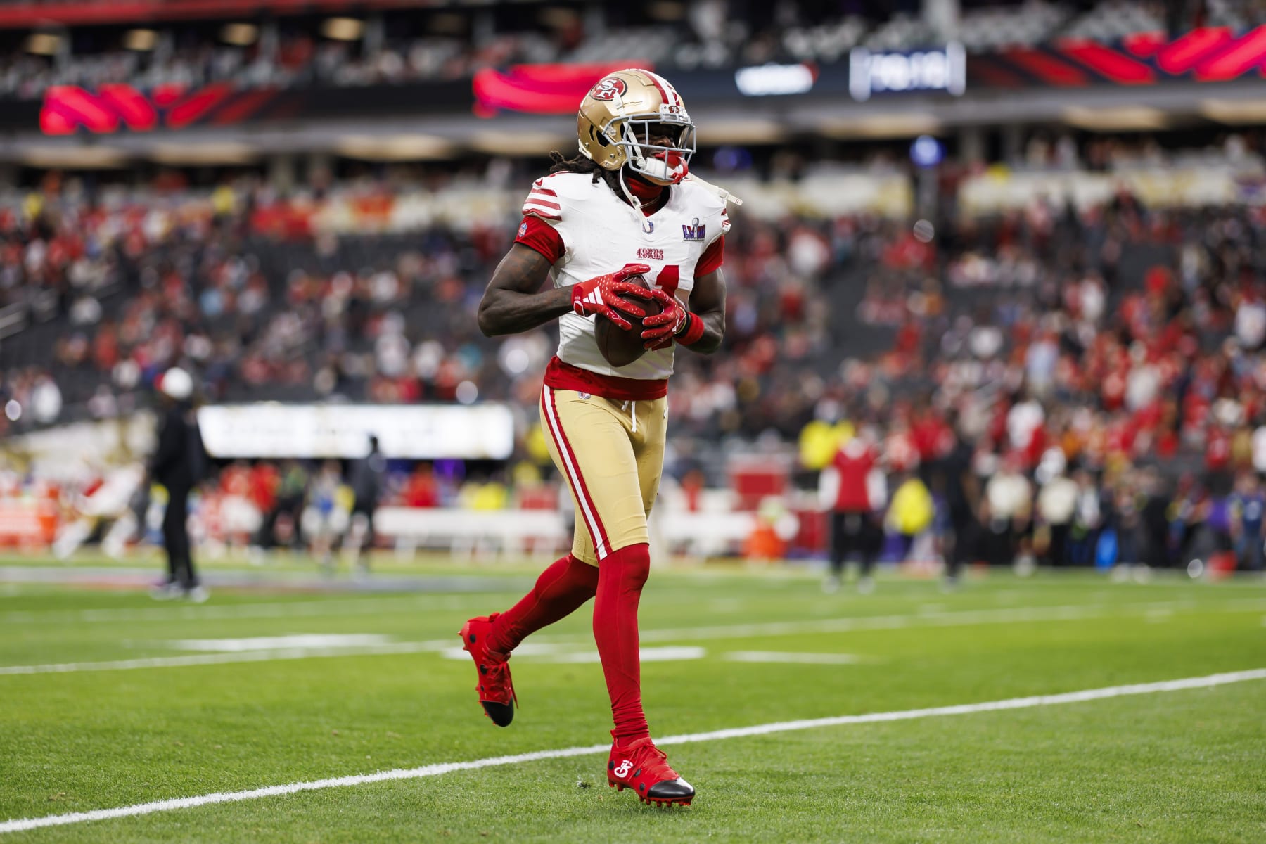 LAS VEGAS, NEVADA - FEBRUARY 11: Brandon Aiyuk #11 of the San Francisco 49ers runs the ball during pregame warmups before Super Bowl LVIII against the Kansas City Chiefs at Allegiant Stadium on February 11, 2024 in Las Vegas, Nevada. (Photo by Ryan Kang/Getty Images)