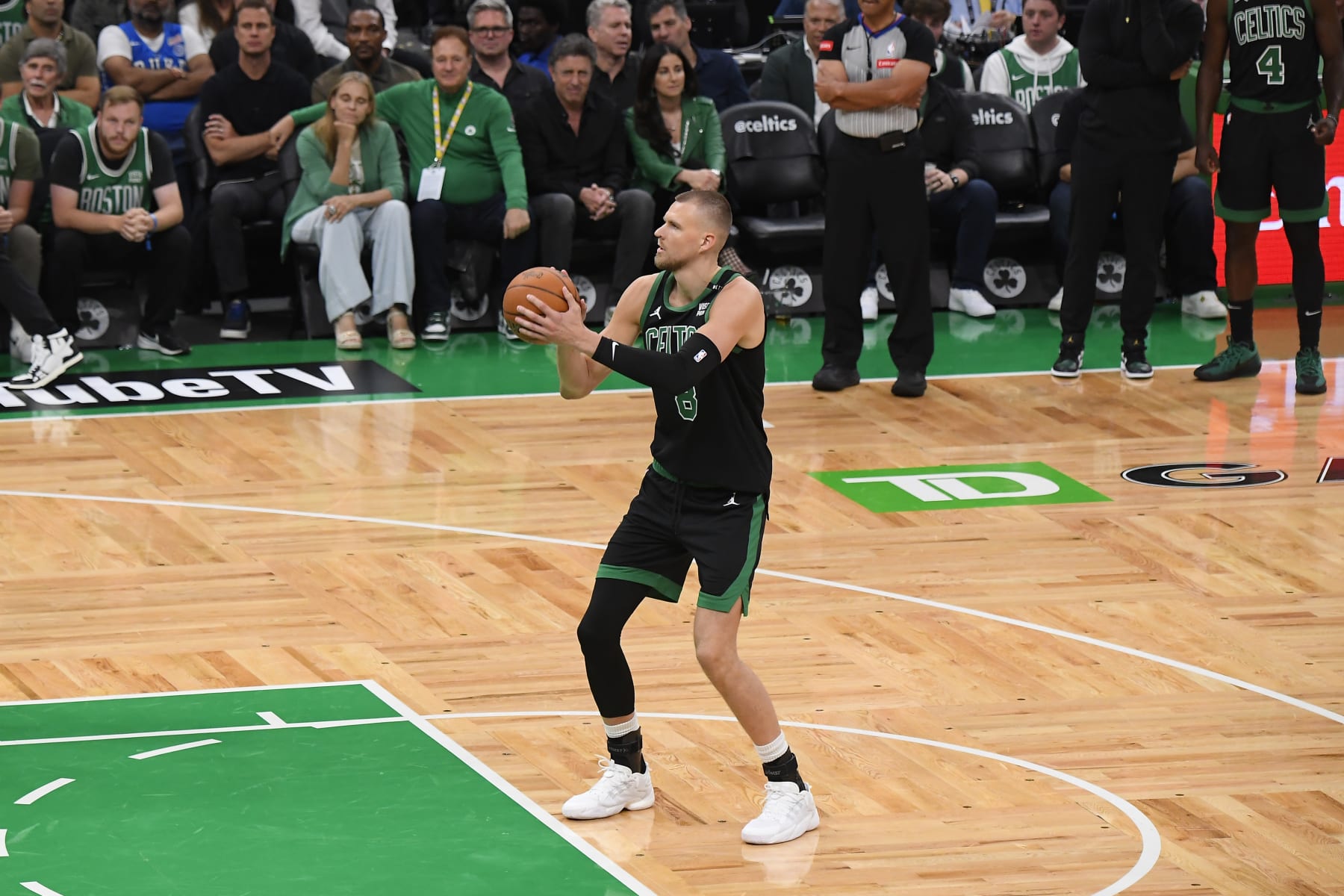 BOSTON, MA - JUNE 9: Kristaps Porzingis #8 of the Boston Celtics shoots a free throw during the game against the Dallas Mavericks during Game 2 of the 2024 NBA Finals on June 9, 2024 at the TD Garden in Boston, Massachusetts. NOTE TO USER: User expressly acknowledges and agrees that, by downloading and or using this photograph, User is consenting to the terms and conditions of the Getty Images License Agreement. Mandatory Copyright Notice: Copyright 2024 NBAE  (Photo by Brian Babineau/NBAE via Getty Images)