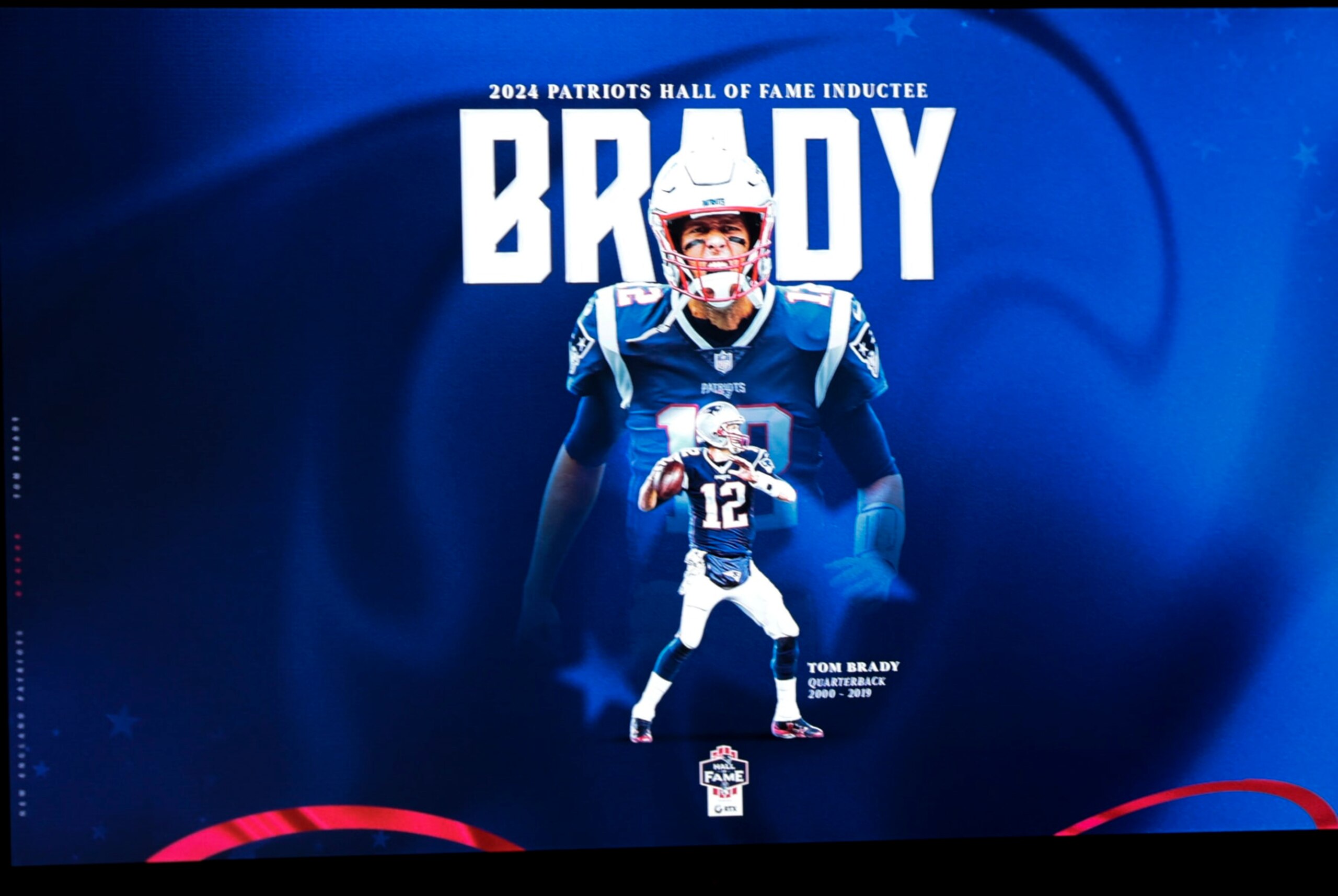 FOXBOROUGH, MA - JUNE 12: Signage for Tom Brady's induction into the New England Patriots Hall of Fame later in the day during New England Patriots Minicamp on June 12, 2024, at The Patriots practice facility at Gillette Stadium in Foxborough, Massachusetts. (Photo by Fred Kfoury III/Icon Sportswire via Getty Images)