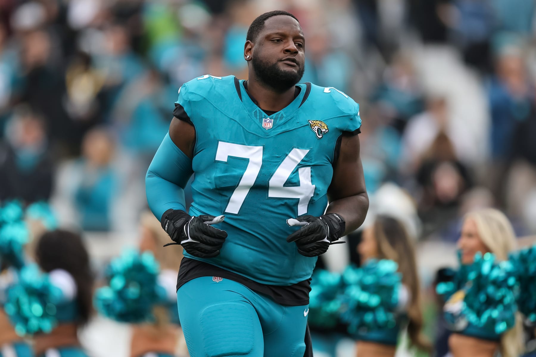 JACKSONVILLE, FLORIDA - NOVEMBER 12: Cam Robinson #74 of the Jacksonville Jaguars is introduced against the San Francisco 49ers during the game at EverBank Field on November 12, 2023 in Jacksonville, Florida. (Photo by Mike Carlson/Getty Images)