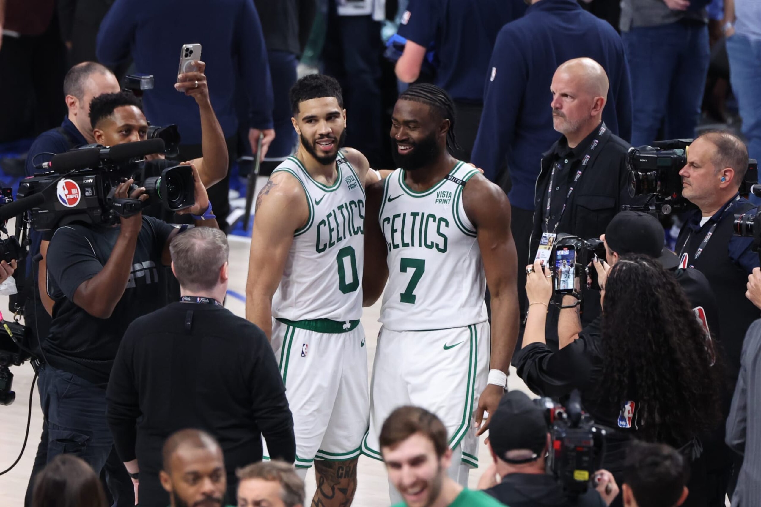 DALLAS, TX - JUNE 12: Jaylen Brown #7 and Jayson Tatum #0 of the Boston Celtics embrace after the game against the Dallas Mavericks during Game 3 of the 2024 NBA Finals on June 12, 2024 at the American Airlines Center in Dallas, Texas. NOTE TO USER: User expressly acknowledges and agrees that, by downloading and or using this photograph, User is consenting to the terms and conditions of the Getty Images License Agreement. Mandatory Copyright Notice: Copyright 2024 NBAE (Photo by Joe Murphy/NBAE via Getty Images)