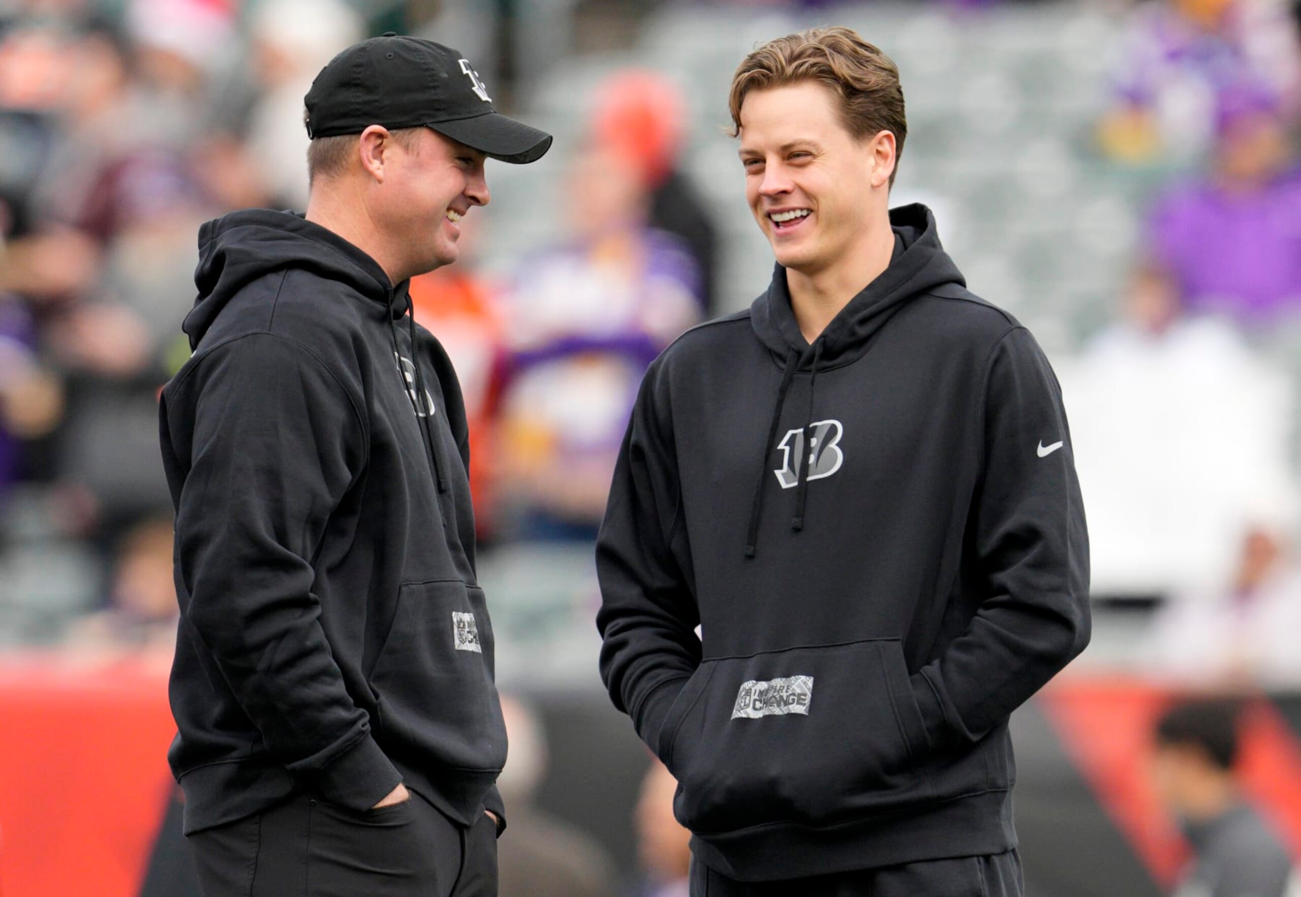 CINCINNATI, OHIO - DECEMBER 16: Joe Burrow (R) of the Cincinnati Bengals speaks with head coach Zac Taylor (L) before the game against the Minnesota Vikings at Paycor Stadium on December 16, 2023 in Cincinnati, Ohio. (Photo by Jeff Dean/Getty Images)