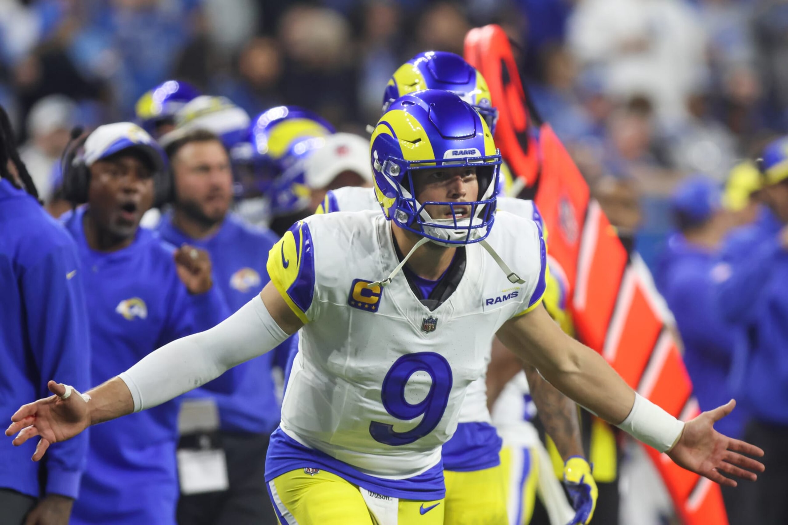 DETROIT, MI - JANUARY 14:  Los Angeles Rams quarterback Matthew Stafford (9) waits to congratulate his teammates after a touchdown during an NFL NFC Wild Card playoff football game between the Los Angeles Rams and the Detroit Lions on January 14, 2024 at Ford Field in Detroit, Michigan.  (Photo by Scott W. Grau/Icon Sportswire via Getty Images)