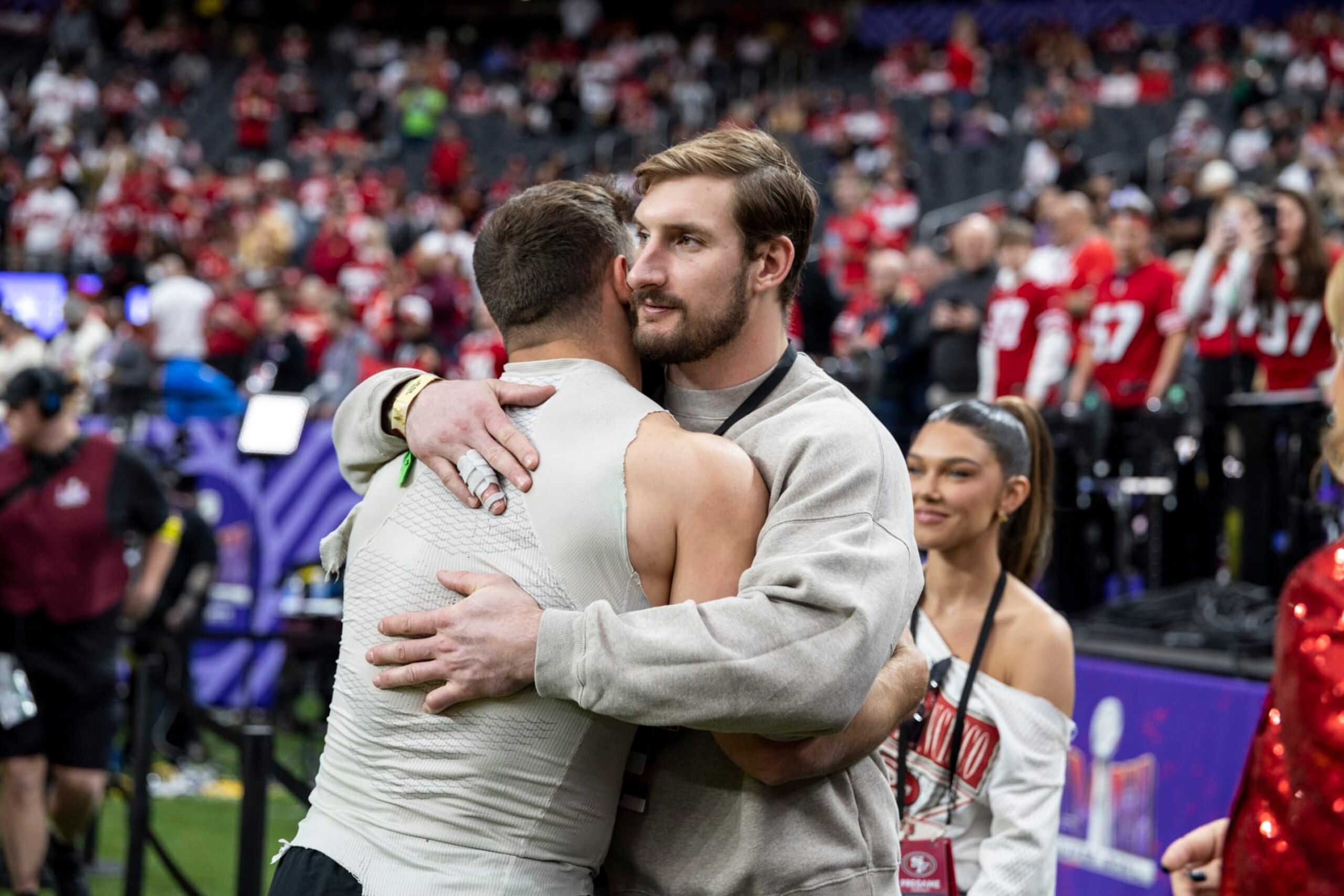 LAS VEGAS, NEVADA - FEBRUARY 11: Nick Bosa #97 of the San Francisco 49ers hugs his brother, Joey Bosa,  prior to the NFL Super Bowl 58 football game between the San Francisco 49ers and the Kansas City Chiefs at Allegiant Stadium on February 11, 2024 in Las Vegas, Nevada. (Photo by Michael Owens/Getty Images)