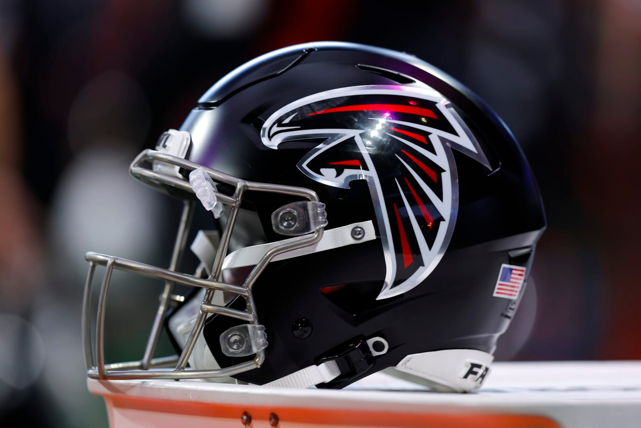 ATLANTA, GEORGIA - DECEMBER 24: An Atlanta Falcons helmet sits in the bench area prior to the game against the Indianapolis Colts at Mercedes-Benz Stadium on December 24, 2023 in Atlanta, Georgia. (Photo by Todd Kirkland/Getty Images)