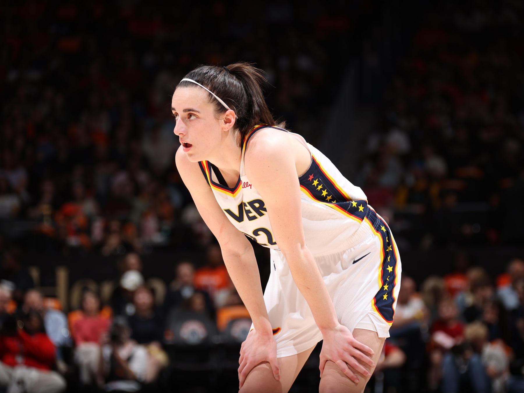WASHINGTON, D.C. - JUNE 7: Caitlin Clark #22 of the Indiana Fever looks on during the game against the Washington Mystics during a 2024 Commissioner's Cup game on June 7, 2024 at Entertainment and Sports Arena in Washington, D.C. NOTE TO USER: User expressly acknowledges and agrees that, by downloading and or using this photograph, User is consenting to the terms and conditions of the Getty Images License Agreement. Mandatory Copyright Notice: Copyright 2024 NBAE (Photo by Stephen Gosling/NBAE via Getty Images)