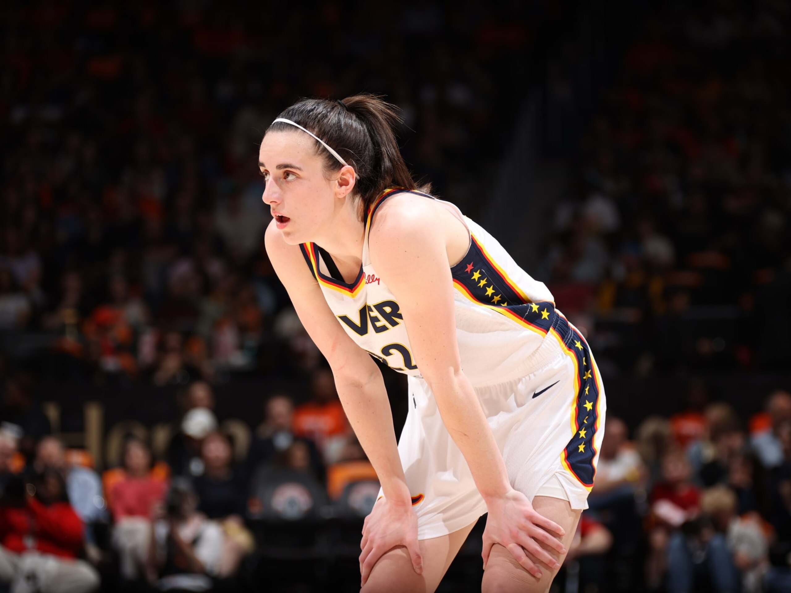 WASHINGTON, D.C. - JUNE 7: Caitlin Clark #22 of the Indiana Fever looks on during the game against the Washington Mystics during a 2024 Commissioner's Cup game on June 7, 2024 at Entertainment and Sports Arena in Washington, D.C. NOTE TO USER: User expressly acknowledges and agrees that, by downloading and or using this photograph, User is consenting to the terms and conditions of the Getty Images License Agreement. Mandatory Copyright Notice: Copyright 2024 NBAE (Photo by Stephen Gosling/NBAE via Getty Images)