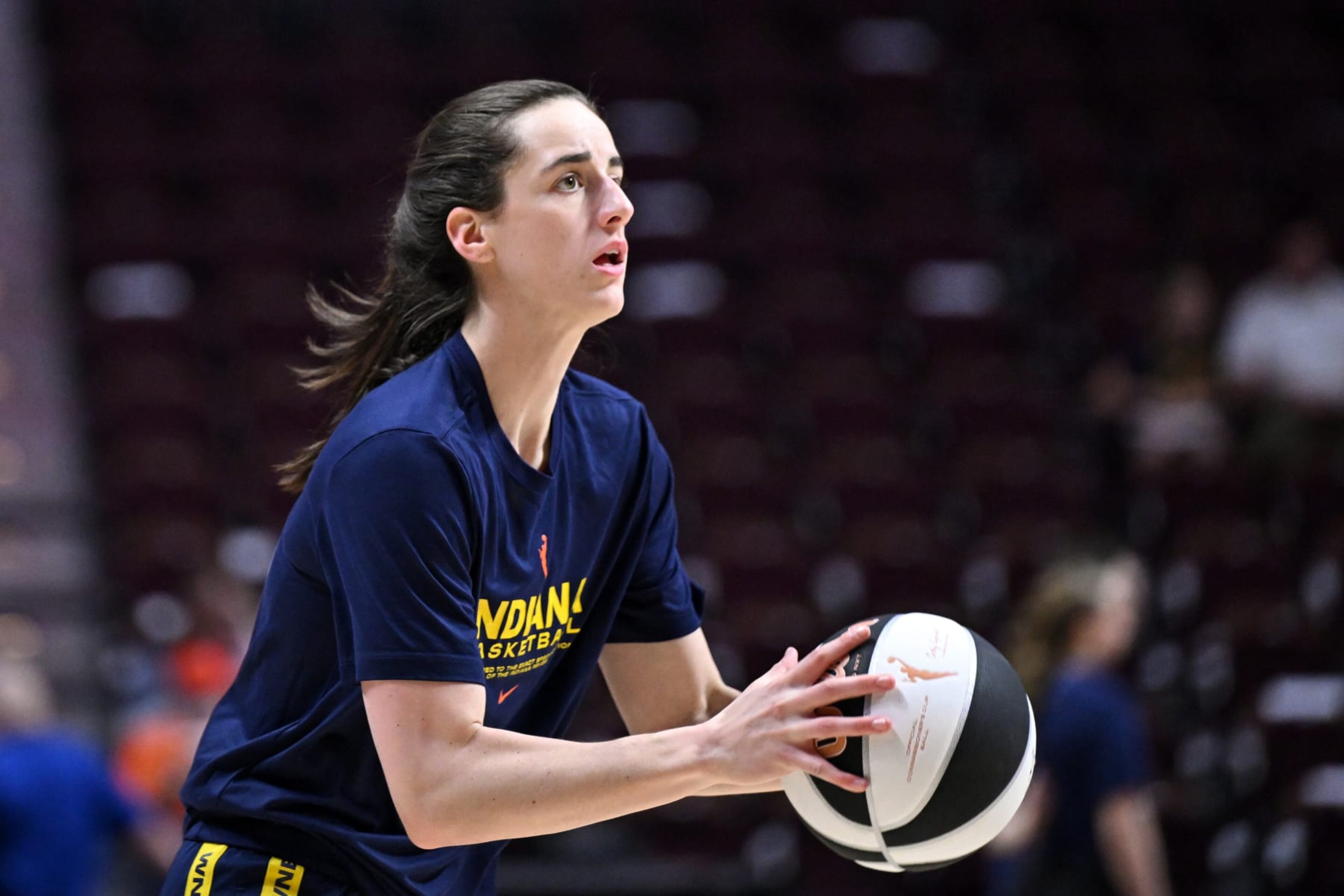 UNCASVILLE, CONNECTICUT - JUNE 10: Caitlin Clark #22 of the Indiana Fever takes a shot during warmups before a game against the Connecticut Sun at the Mohegan Sun Arena on June 10, 2024 in Uncasville, Connecticut. NOTE TO USER: User expressly acknowledges and agrees that, by downloading and or using this photograph, User is consenting to the terms and conditions of the Getty Images License Agreement. (Photo by Brian Fluharty/Getty Images) UNCASVILLE, CONNECTICUT - JUNE 10: Caitlin Clark #22 of the Indiana Fever takes a shot during warmups before a game against the Connecticut Sun at the Mohegan Sun Arena on June 10, 2024 in Uncasville, Connecticut. NOTE TO USER: User expressly acknowledges and agrees that, by downloading and or using this photograph, User is consenting to the terms and conditions of the Getty Images License Agreement. (Photo by Brian Fluharty/Getty Images)