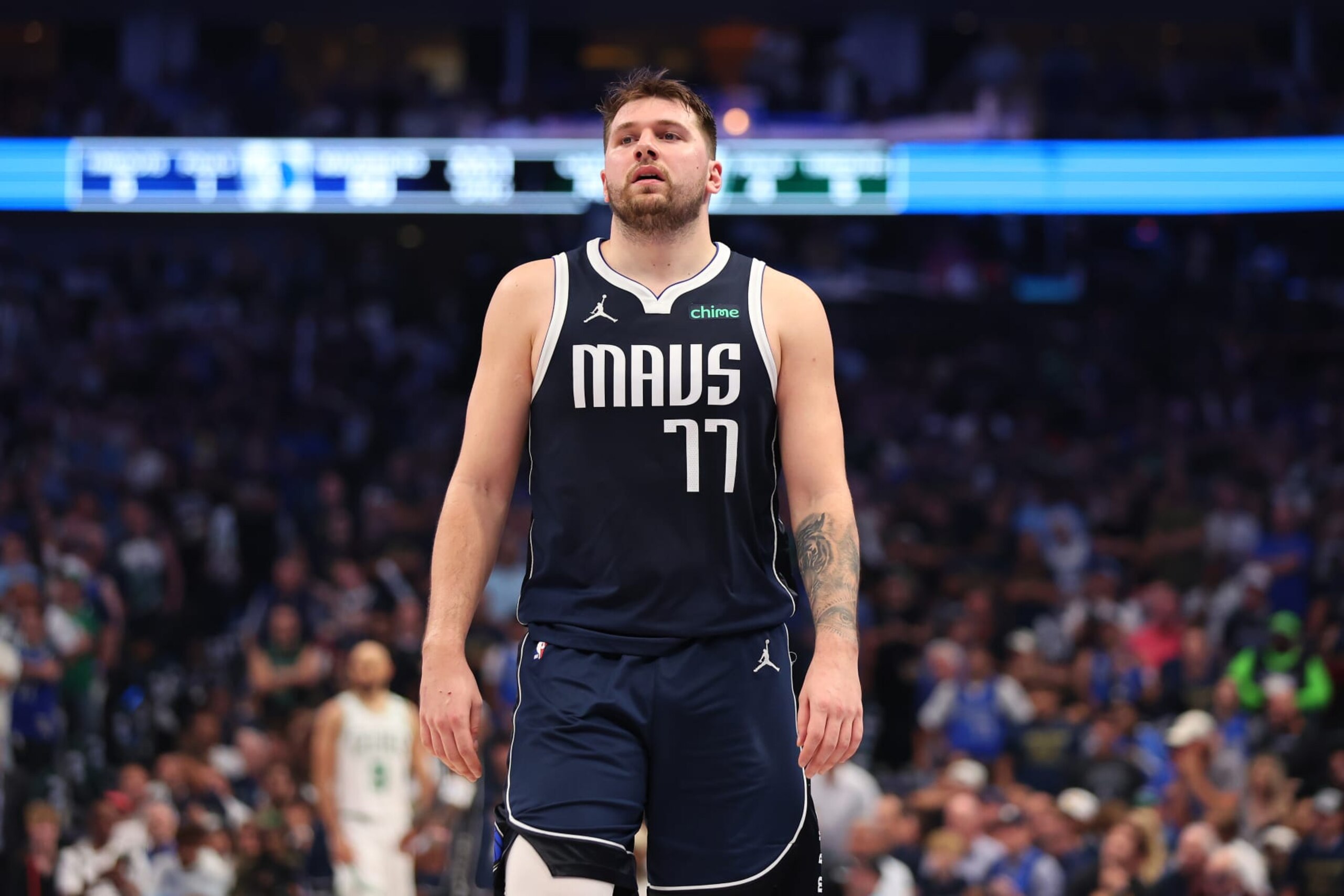 DALLAS, TEXAS - JUNE 12: Luka DonÄiÄ #77 of the Dallas Mavericks walks across the court in the second quarter against the Boston Celtics in Game Three of the 2024 NBA Finals at American Airlines Center on June 12, 2024 in Dallas, Texas. NOTE TO USER: User expressly acknowledges and agrees that, by downloading and or using this photograph, User is consenting to the terms and conditions of the Getty Images License Agreement. (Photo by Stacy Revere/Getty Images)