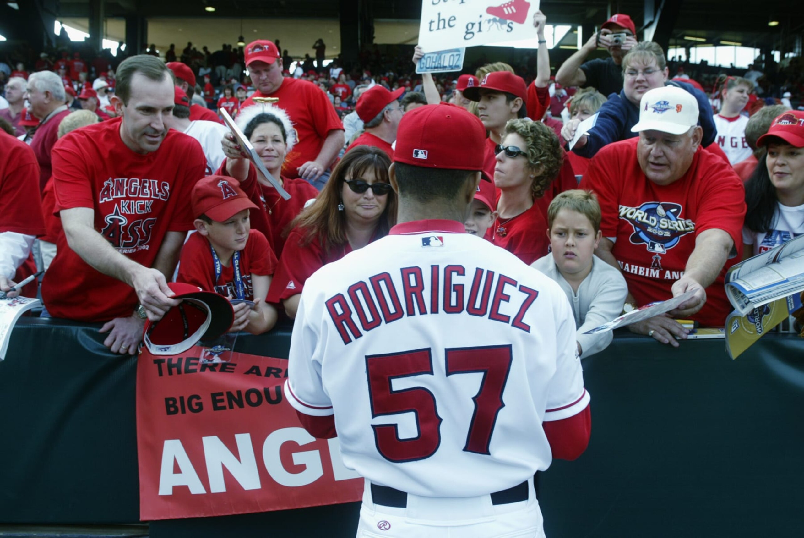 ANAHEIM, CA - OCTOBER 19:  Pitcher Francisco Rodriguez #57 of the Anaheim Angels signs autographs before game one of the World Series against the San Francisco Giants on October 19, 2002 at Edison Field in Anaheim, California.  The Giants defeated the Angels 4-3.  (Photo by Brian Bahr/Getty Images)