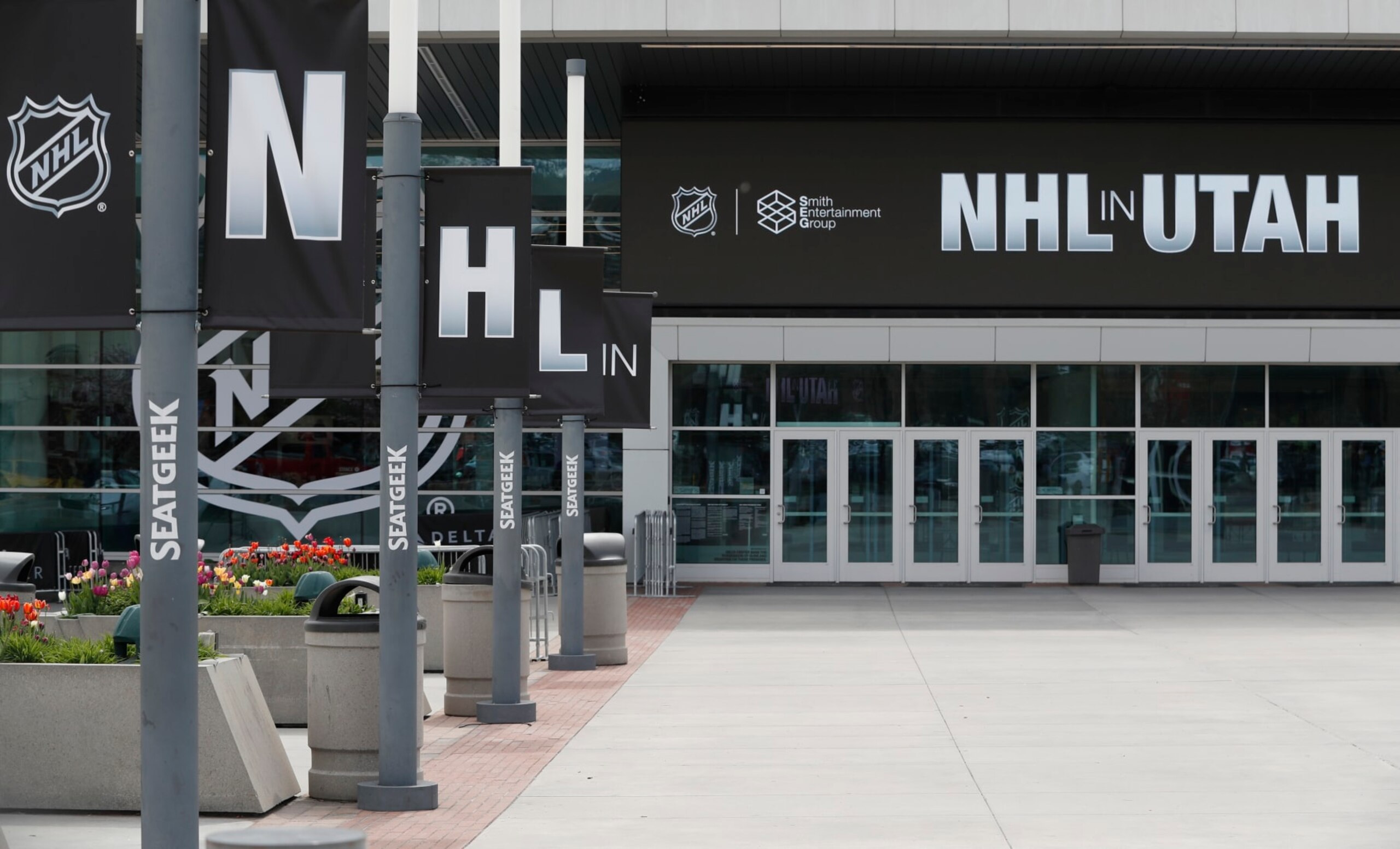 SALT LAKE CITY, UT - APRIL 19: Banners line the main entrance of the Delta Center is seen with the "NHL in Utah" logos on April 19, 2024 in Salt Lake City, Utah. The NHL has allowed the sale of the Arizona Coyotes and the team will relocate to Salt Lake City, Utah. (Photo by Chris Gardner/Getty Images)