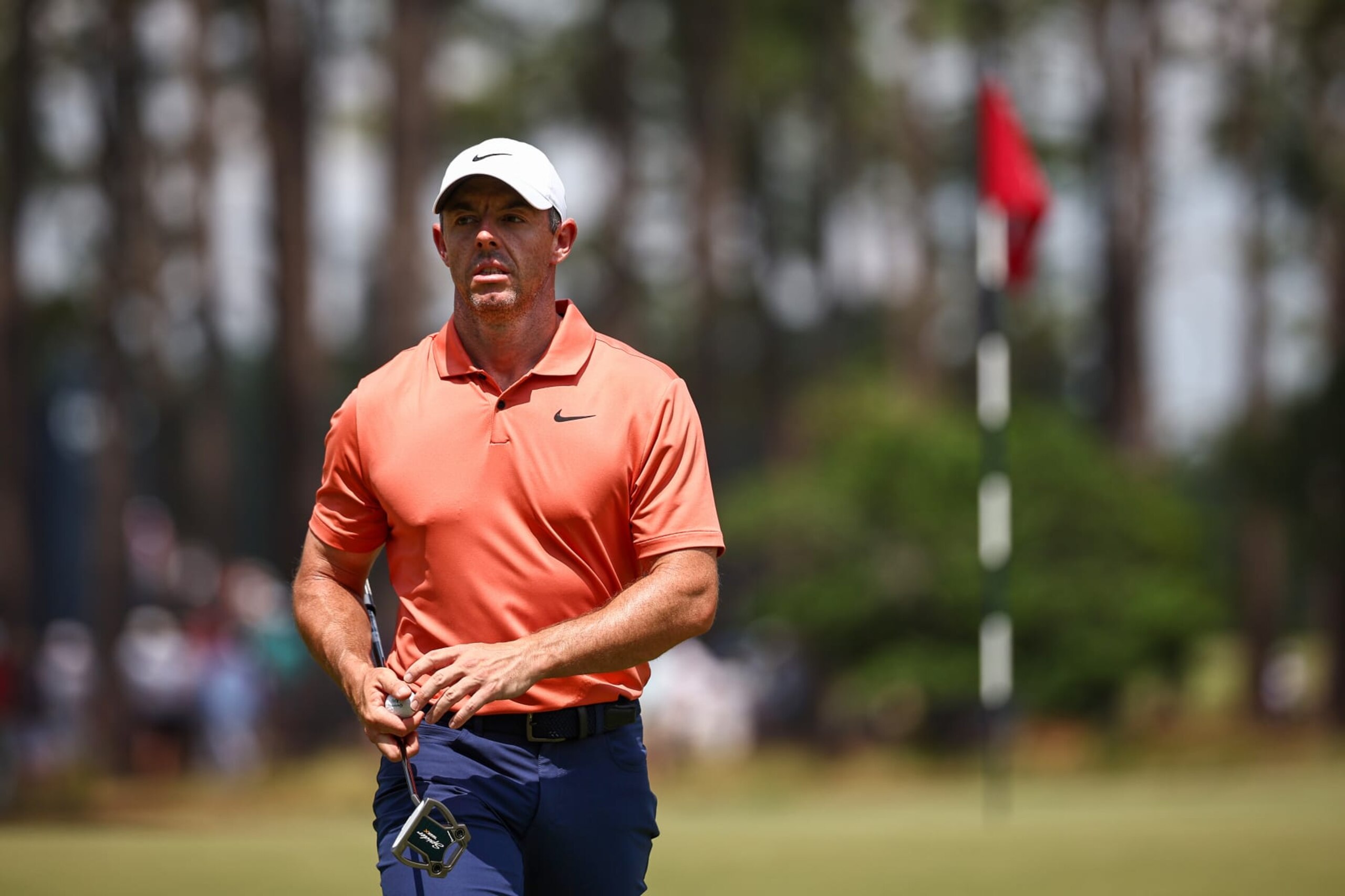 PINEHURST, NORTH CAROLINA - JUNE 13: Rory McIlroy of Northern Ireland walks off the sixth green during the first round of the 124th U.S. Open at Pinehurst Resort on June 13, 2024 in Pinehurst, North Carolina. (Photo by Jared C. Tilton/Getty Images)