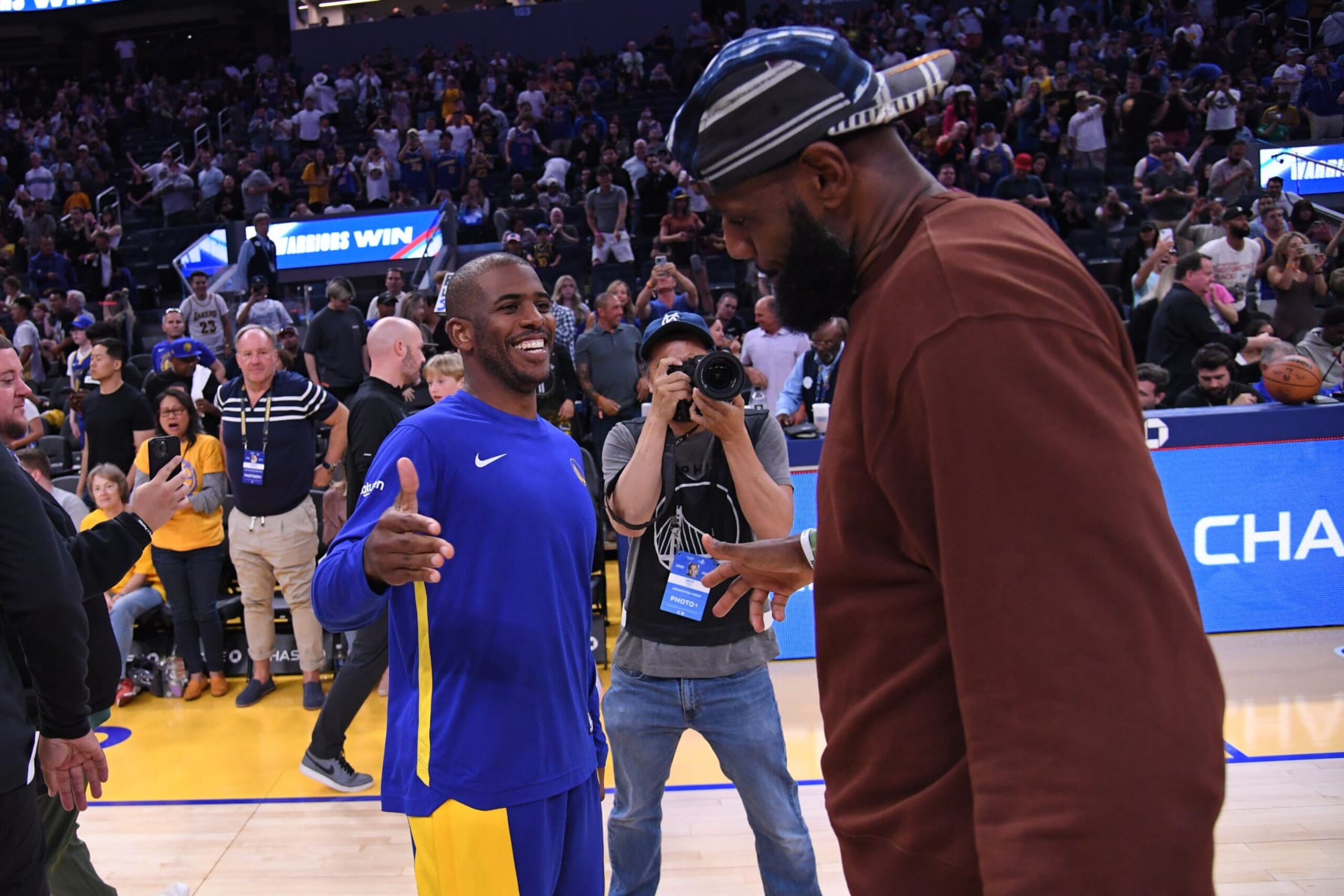 SAN FRANCISCO, CA - OCTOBER 7: Chris Paul #3 of the Golden State Warriors talks with LeBron James #23 of the Los Angeles Lakers after the game on October 7, 2023 at Chase Center in San Francisco, California. NOTE TO USER: User expressly acknowledges and agrees that, by downloading and or using this photograph, user is consenting to the terms and conditions of Getty Images License Agreement. Mandatory Copyright Notice: Copyright 2023 NBAE (Photo by Noah Graham/NBAE via Getty Images)