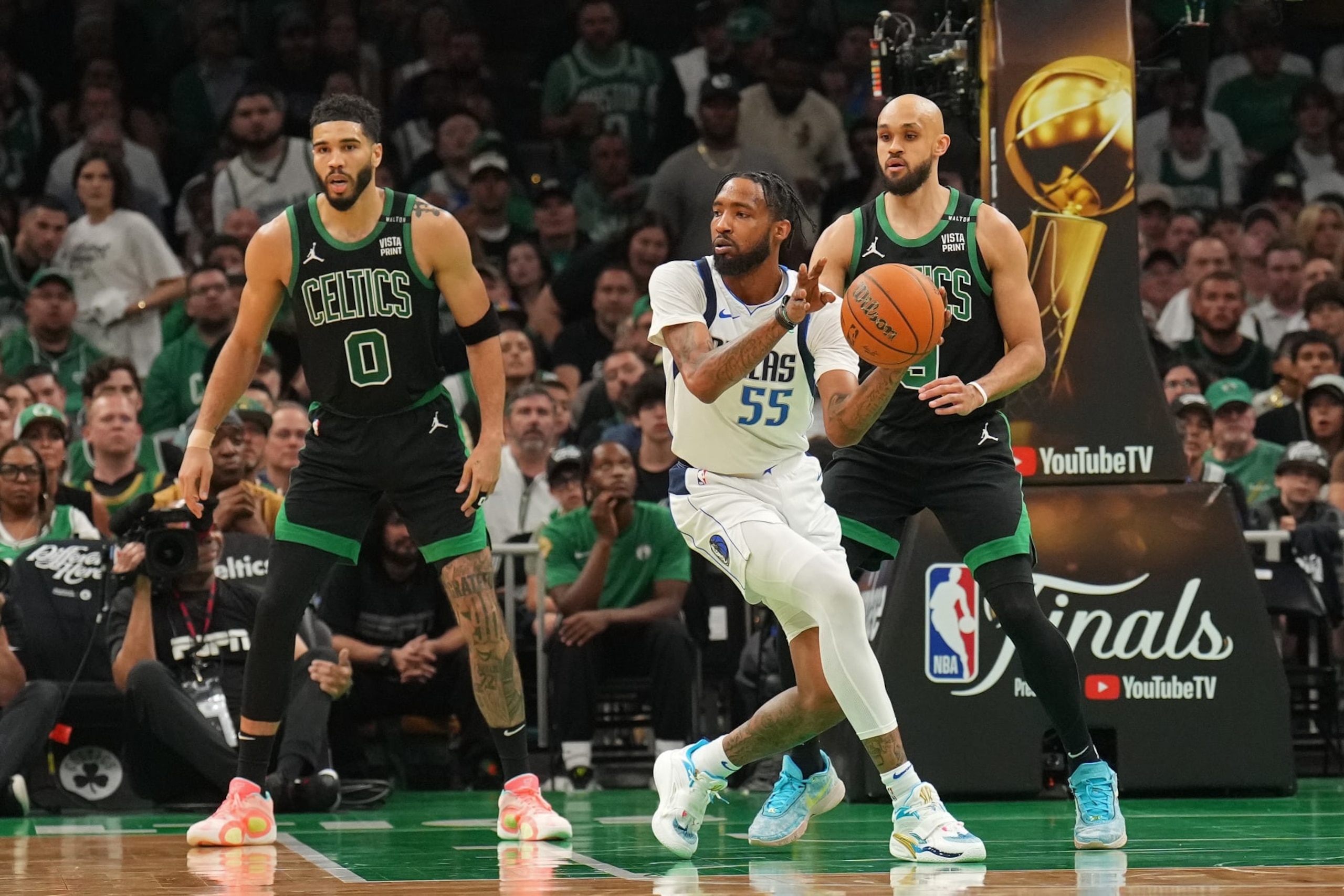 BOSTON, MA - JUNE 9:  Derrick Jones Jr. #55 of the Dallas Mavericks passes the ball during the game  against the Boston Celtics during Game 2 of the 2024 NBA Finals on June 9, 2024 at the TD Garden in Boston, Massachusetts. NOTE TO USER: User expressly acknowledges and agrees that, by downloading and or using this photograph, User is consenting to the terms and conditions of the Getty Images License Agreement. Mandatory Copyright Notice: Copyright 2024 NBAE  (Photo by Jesse D. Garrabrant/NBAE via Getty Images)