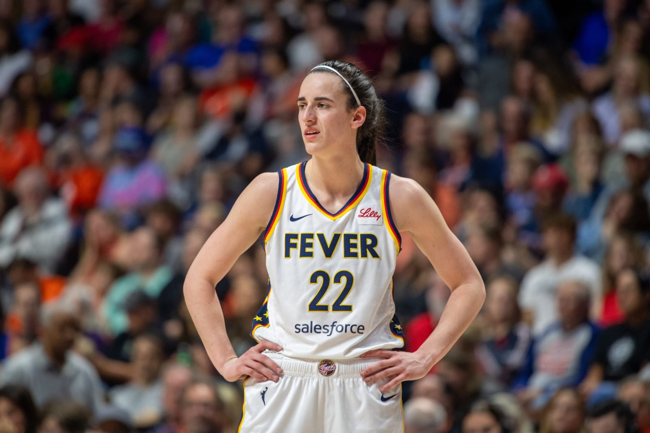 UNCASVILLE, CT - JUNE 10: Indiana Fever guard Caitlin Clark (22) looks on during a WNBA Commissioner's Cup game between the Indiana Fever and the Connecticut Sun on June 10, 2024, at Mohegan Sun Arena in Uncasville, CT. (Photo by Erica Denhoff/Icon Sportswire via Getty Images) UNCASVILLE, CT - JUNE 10: Indiana Fever guard Caitlin Clark (22) looks on during a WNBA Commissioner's Cup game between the Indiana Fever and the Connecticut Sun on June 10, 2024, at Mohegan Sun Arena in Uncasville, CT. (Photo by Erica Denhoff/Icon Sportswire via Getty Images)
