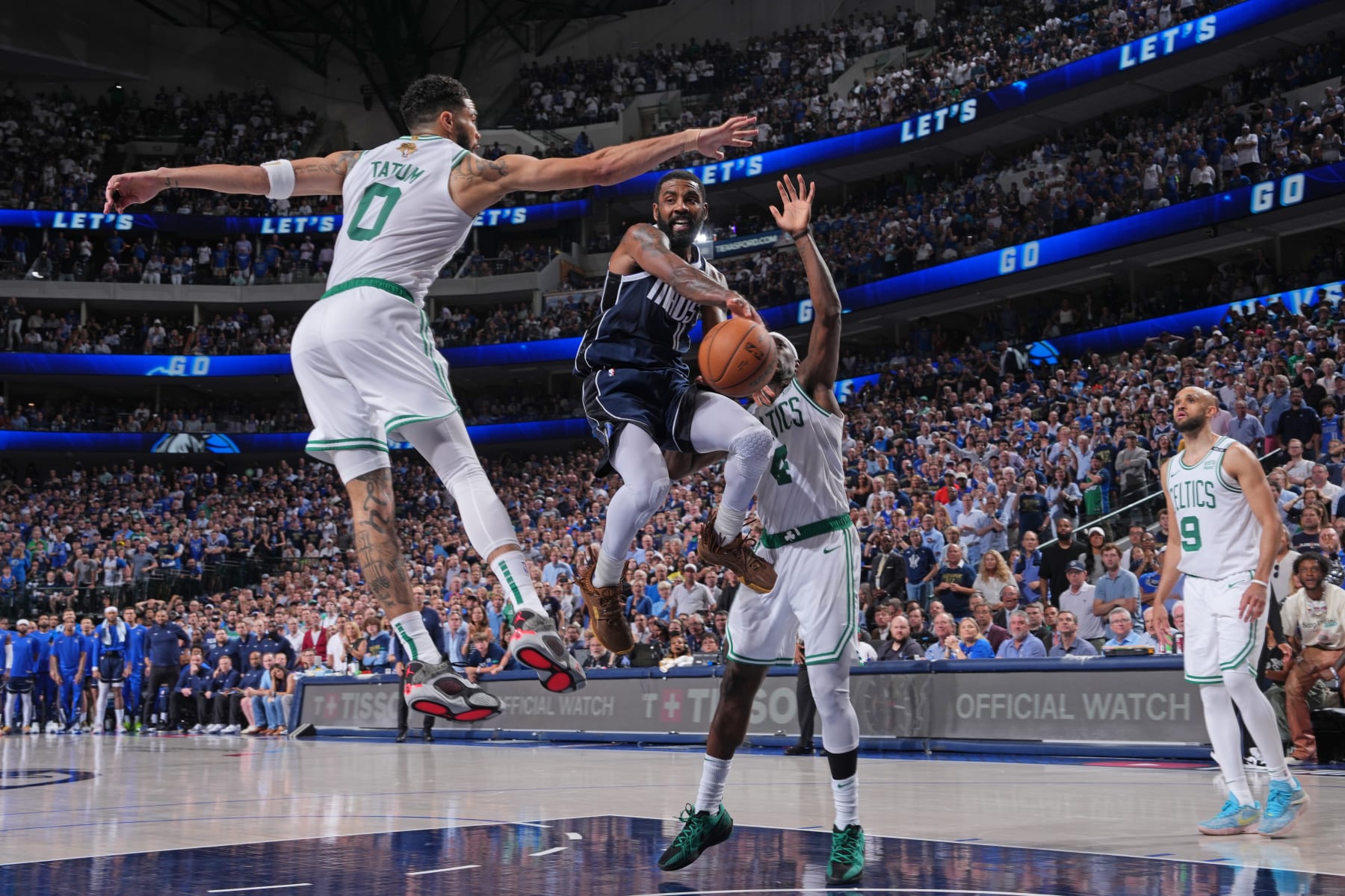 DALLAS, TX - JUNE 12: Kyrie Irving #11 of the Dallas Mavericks passes the ball during the game against the Boston Celtics during Game 3 of the 2024 NBA Finals on June 12, 2024 at the American Airlines Center in Dallas, Texas. NOTE TO USER: User expressly acknowledges and agrees that, by downloading and or using this photograph, User is consenting to the terms and conditions of the Getty Images License Agreement. Mandatory Copyright Notice: Copyright 2024 NBAE (Photo by Jesse D. Garrabrant/NBAE via Getty Images)