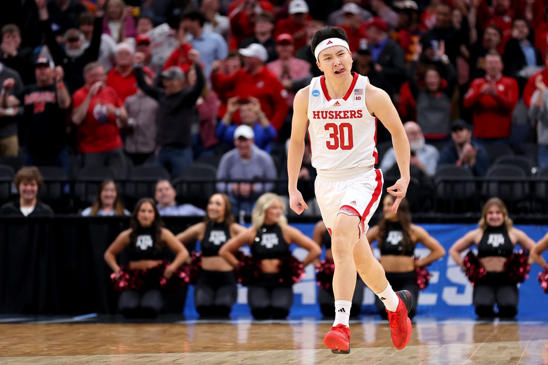 MEMPHIS, TENNESSEE - MARCH 22:   Keisei Tominaga #30 of the Nebraska Cornhuskers celebrates a basket during the first half against the Texas A&M Aggies in the first round of the NCAA Men's Basketball Tournament at FedExForum on March 22, 2024 in Memphis, Tennessee. (Photo by Stacy Revere/Getty Images)