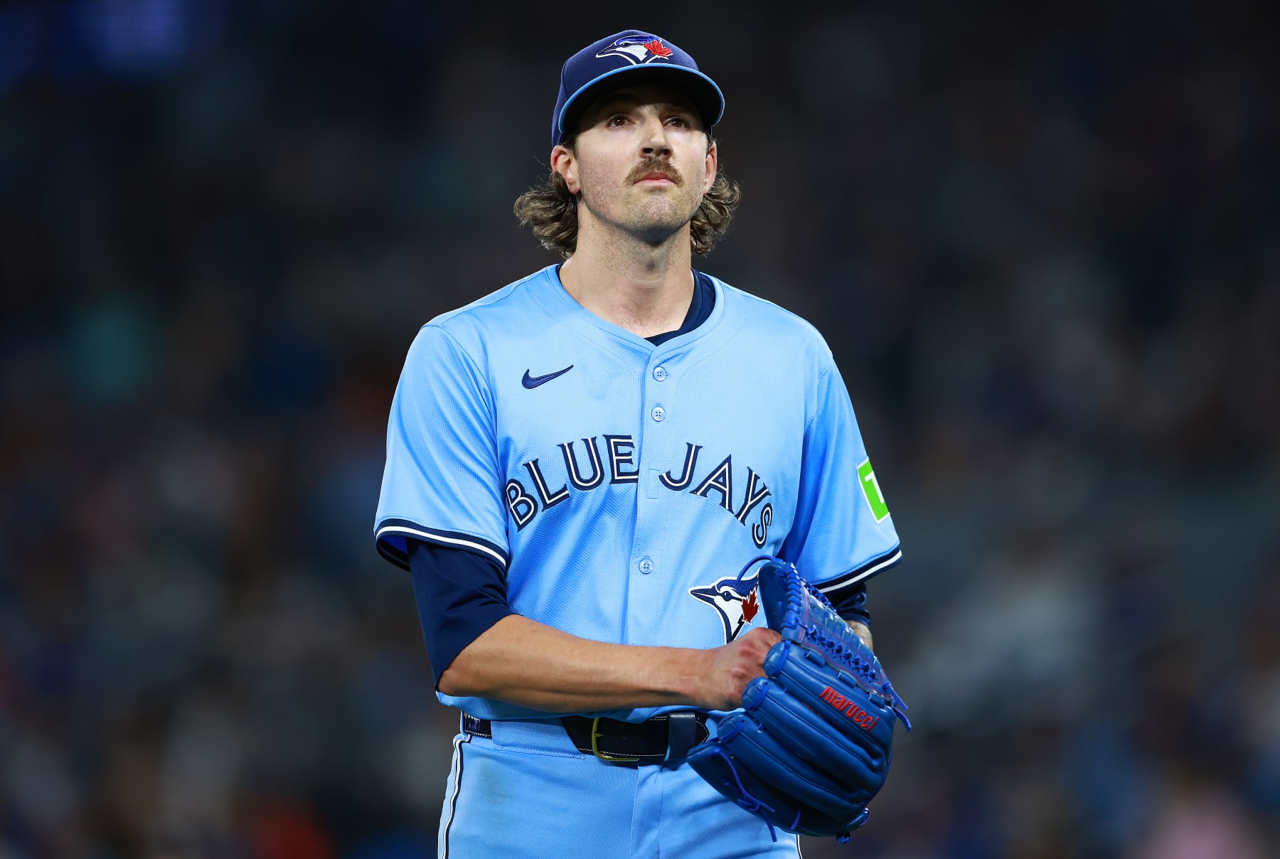 TORONTO, ON - MAY 11:  Kevin Gausman #34 of the Toronto Blue Jays walks to the dugout during a game against the Minnesota Twins at Rogers Centre on May 11, 2024 in Toronto, Ontario, Canada.  (Photo by Vaughn Ridley/Getty Images)