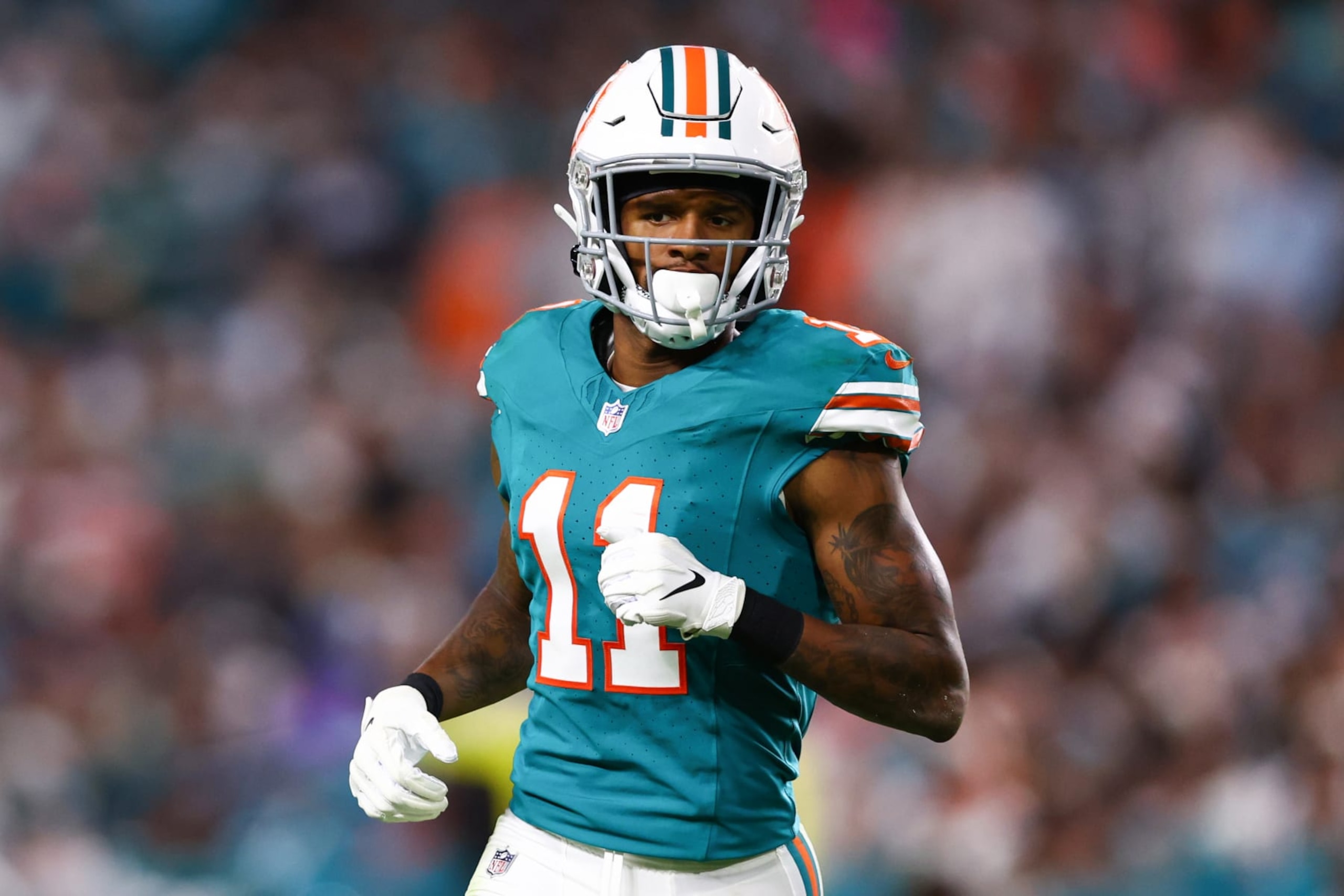 MIAMI GARDENS, FLORIDA - DECEMBER 24: Cedrick Wilson Jr. #11 of the Miami Dolphins looks on against the Dallas Cowboys during the second half of the game at Hard Rock Stadium on December 24, 2023 in Miami Gardens, Florida. (Photo by Megan Briggs/Getty Images) MIAMI GARDENS, FLORIDA - DECEMBER 24: Cedrick Wilson Jr. #11 of the Miami Dolphins looks on against the Dallas Cowboys during the second half of the game at Hard Rock Stadium on December 24, 2023 in Miami Gardens, Florida. (Photo by Megan Briggs/Getty Images)