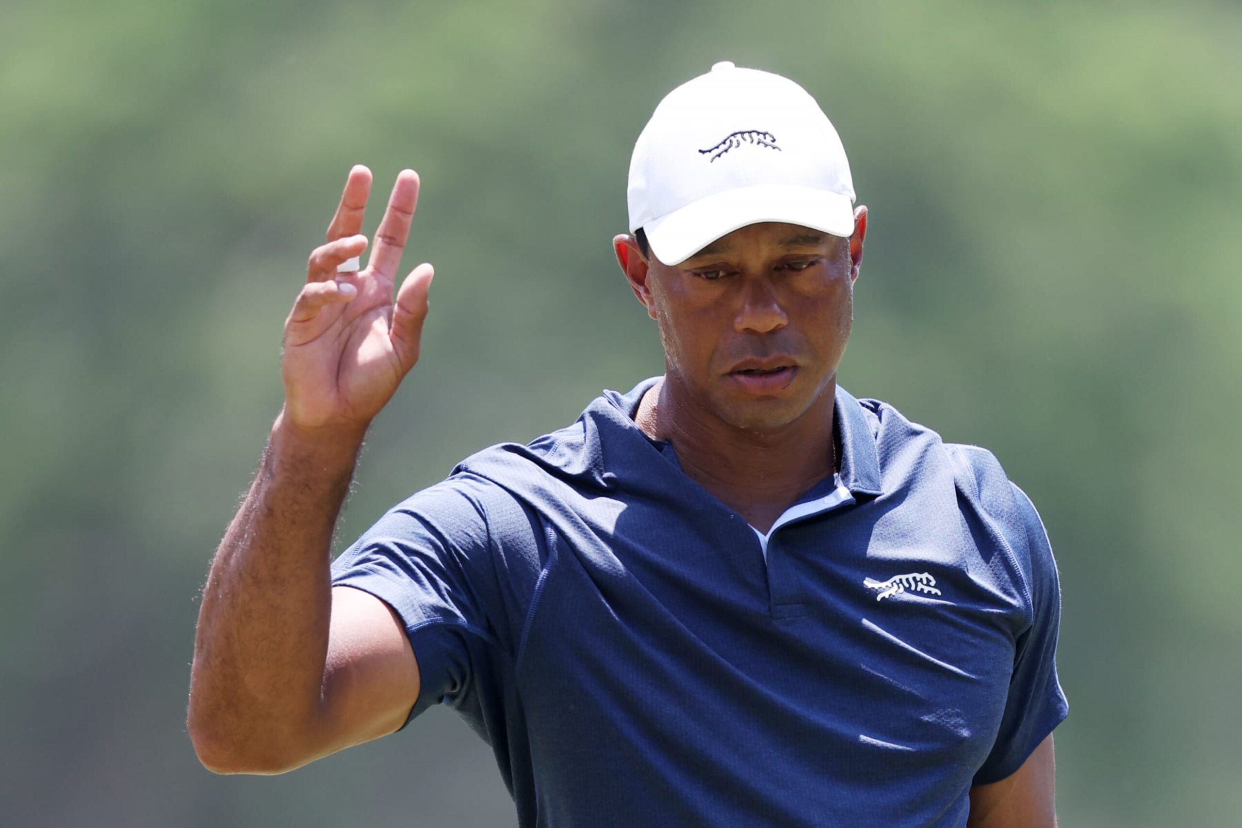 PINEHURST, NORTH CAROLINA - JUNE 14: Tiger Woods of the United States reacts after putting on the second green during the second round of the 124th U.S. Open at Pinehurst Resort on June 14, 2024 in Pinehurst, North Carolina. (Photo by Sean M. Haffey/Getty Images)