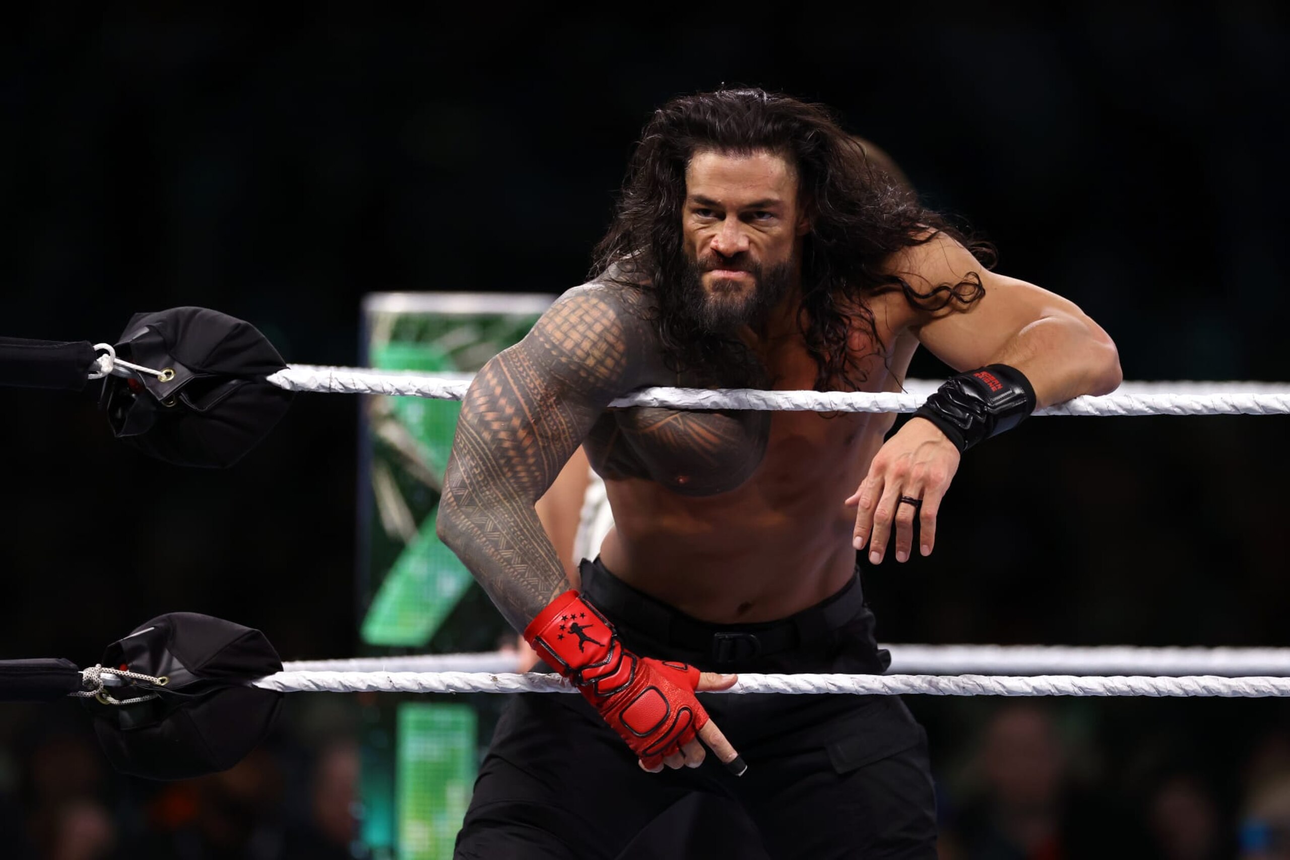 PHILADELPHIA, PENNSYLVANIA - APRIL 06: Roman Reigns looks on during Night One of WrestleMania 40 at Lincoln Financial Field on April 06, 2024 in Philadelphia, Pennsylvania.  (Photo by Tim Nwachukwu/Getty Images)