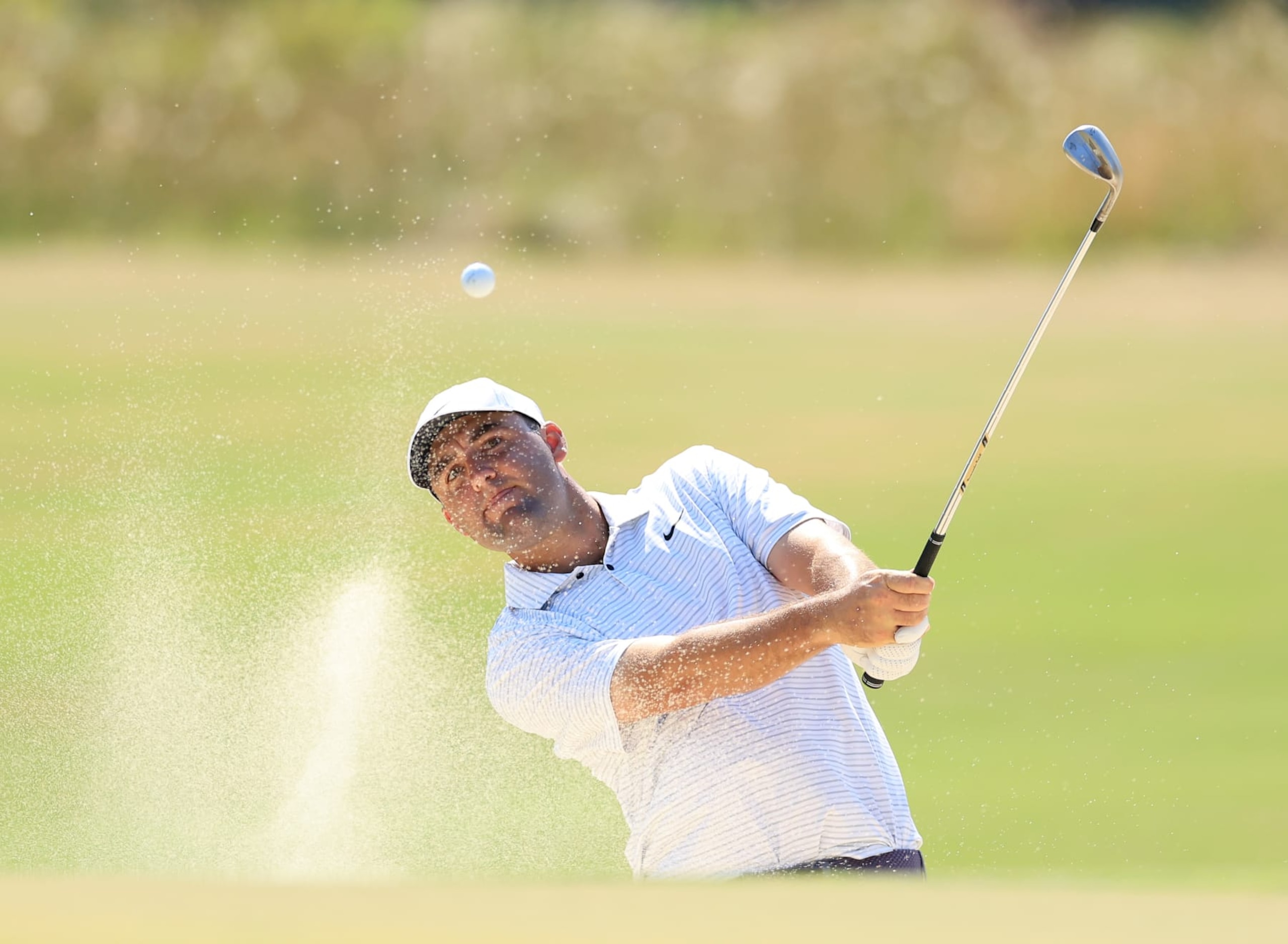PINEHURST, NORTH CAROLINA - JUNE 14: Scottie Scheffler of The United States plays his third shot on the 18th hole during the second round of the 2024 U.S. Open on The No.2 Course at The Pinehurst Resort on June 14, 2024 in Pinehurst, North Carolina. (Photo by David Cannon/Getty Images)