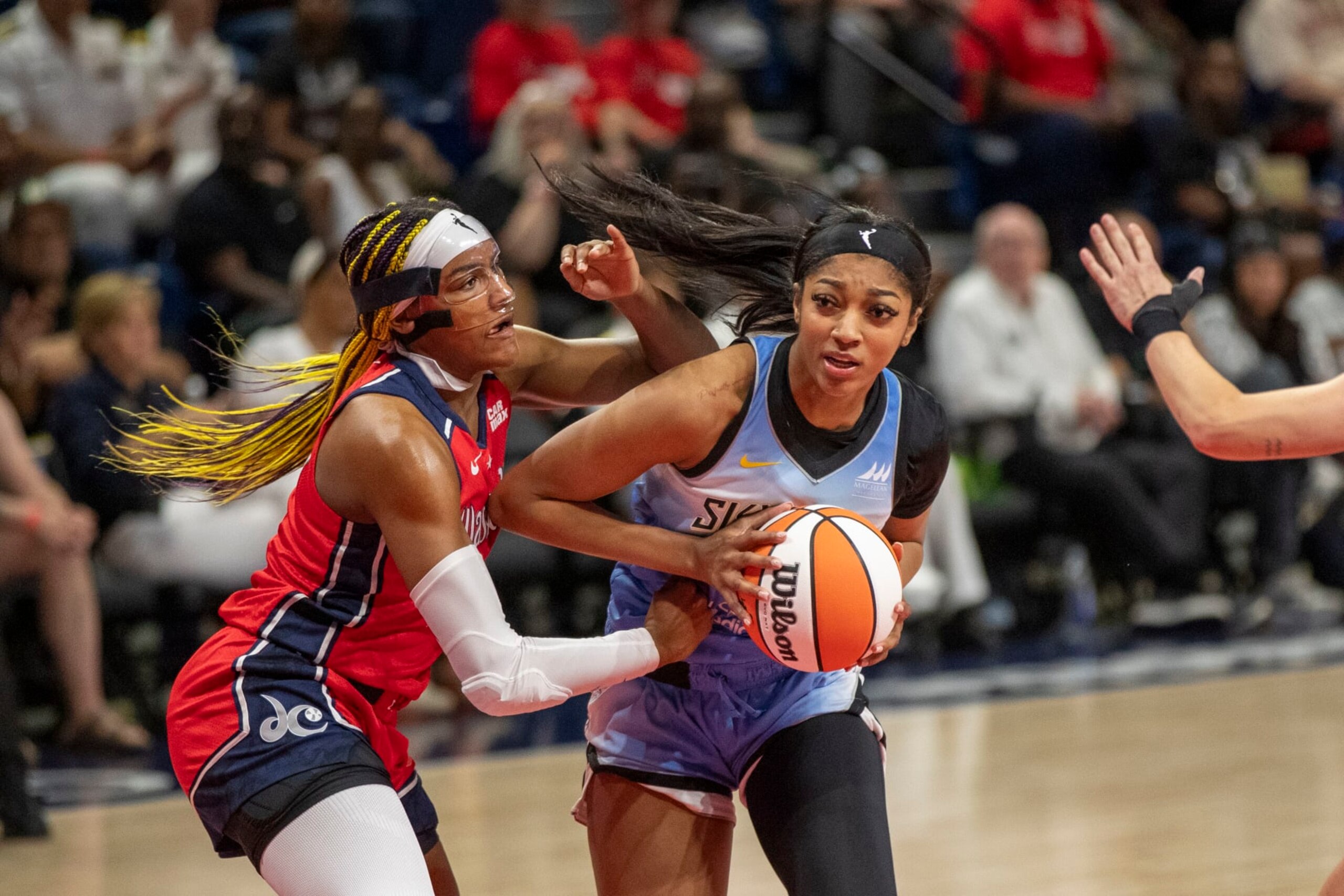 WASHINGTON, DC - JUNE 14: Chicago Sky forward Angel Reese (5) battles in the paint with Washington Mystics forward Aaliyah Edwards (24) during the WNBA game between the Chicago Sky and the Washington Mystics on June 14th, 2024 at Entertainment and Sports Arena in Washington, DC. (Photo by Charles Brock/Icon Sportswire via Getty Images)