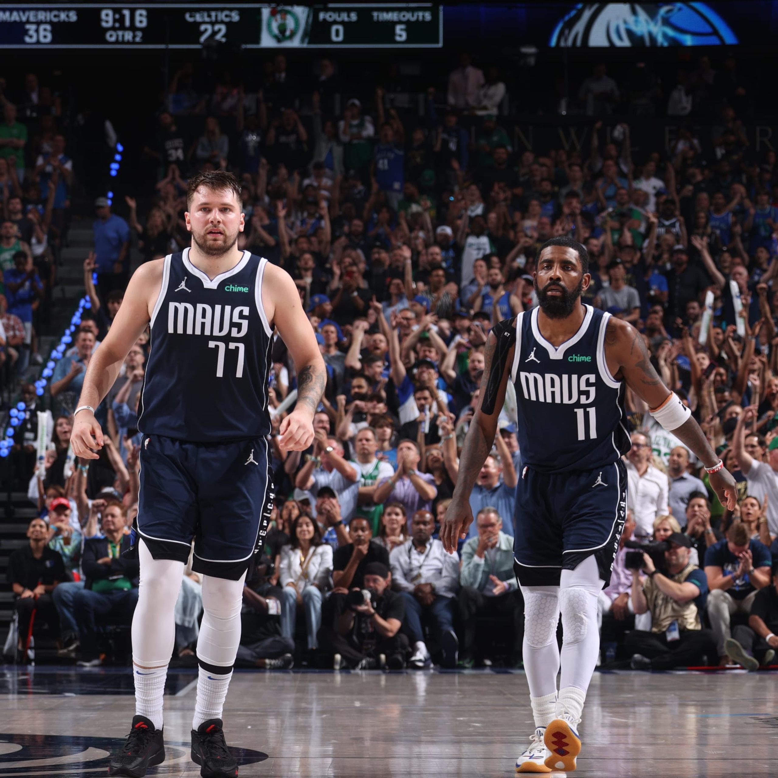 DALLAS, TX - JUNE 14: Luka Doncic #77 and Kyrie Irving #11 of the Dallas Mavericks look on during the game against the Boston Celtics during Game 4 of the 2024 NBA Finals on June 14, 2024 at the American Airlines Center in Dallas, Texas. NOTE TO USER: User expressly acknowledges and agrees that, by downloading and or using this photograph, User is consenting to the terms and conditions of the Getty Images License Agreement. Mandatory Copyright Notice: Copyright 2024 NBAE (Photo by Nathaniel S. Butler/NBAE via Getty Images)