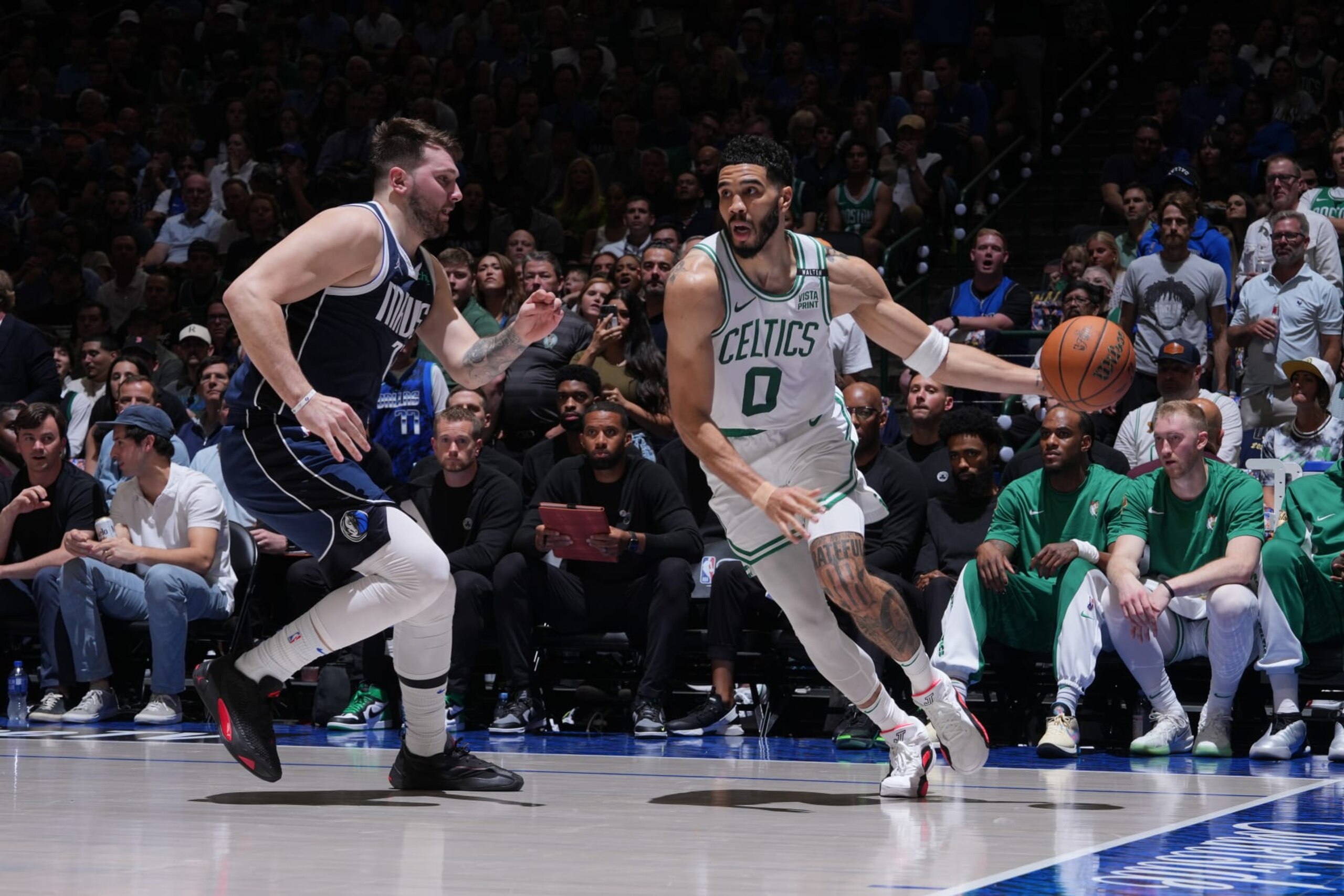 DALLAS, TX - JUNE 14: Jayson Tatum #0 of the Boston Celtics dribbles the ball during the game against the Dallas Mavericks during Game 4 of the 2024 NBA Finals on June 14, 2024 at the American Airlines Center in Dallas, Texas. NOTE TO USER: User expressly acknowledges and agrees that, by downloading and or using this photograph, User is consenting to the terms and conditions of the Getty Images License Agreement. Mandatory Copyright Notice: Copyright 2024 NBAE (Photo by Jesse D. Garrabrant/NBAE via Getty Images)
