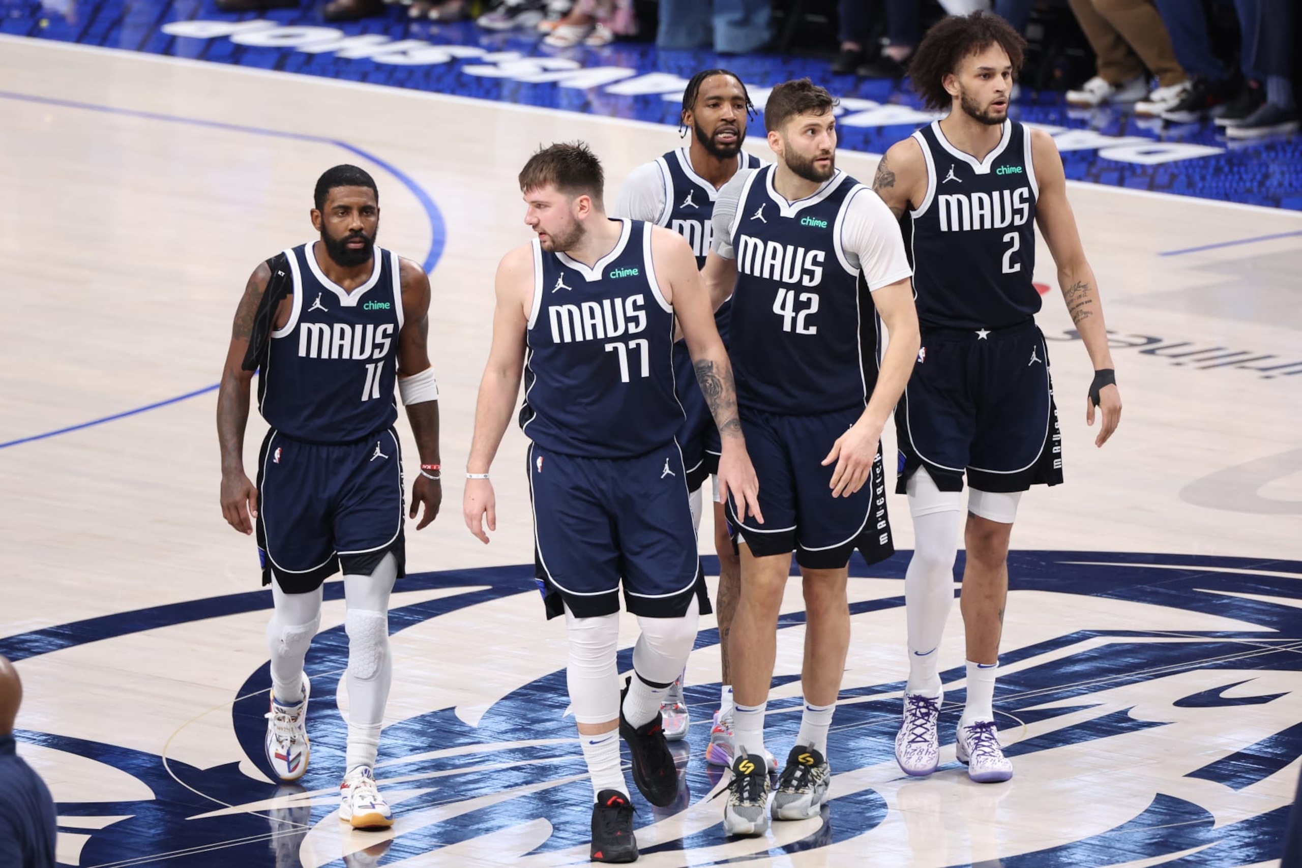 DALLAS, TX - JUNE 14: Kyrie Irving #11 , Luka Doncic #77, Maxi Kleber #42, Dereck Lively II #2  and Derrick Jones Jr. #55 of the Dallas Mavericks look on during the game against the Boston Celtics during Game 4 of the 2024 NBA Finals on June 14, 2024 at the American Airlines Center in Dallas, Texas. NOTE TO USER: User expressly acknowledges and agrees that, by downloading and or using this photograph, User is consenting to the terms and conditions of the Getty Images License Agreement. Mandatory Copyright Notice: Copyright 2024 NBAE (Photo by Joe Murphy/NBAE via Getty Images)