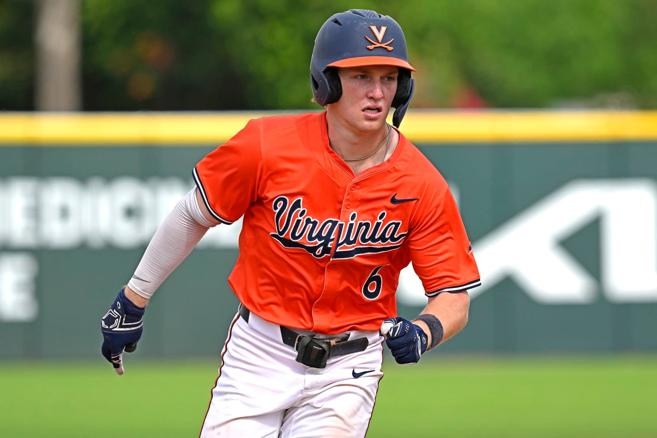 CORAL GABLES, FL - MARCH 10: Virginia infielder Griff O'Ferrall (6) runs to third base in the seventh inning as the Miami Hurricanes faced the Virginia Cavaliers on March 10, 2024, at Mark Light Field at Alex Rodriguez Park in Coral Gables, Florida. (Photo by Samuel Lewis/Icon Sportswire via Getty Images)