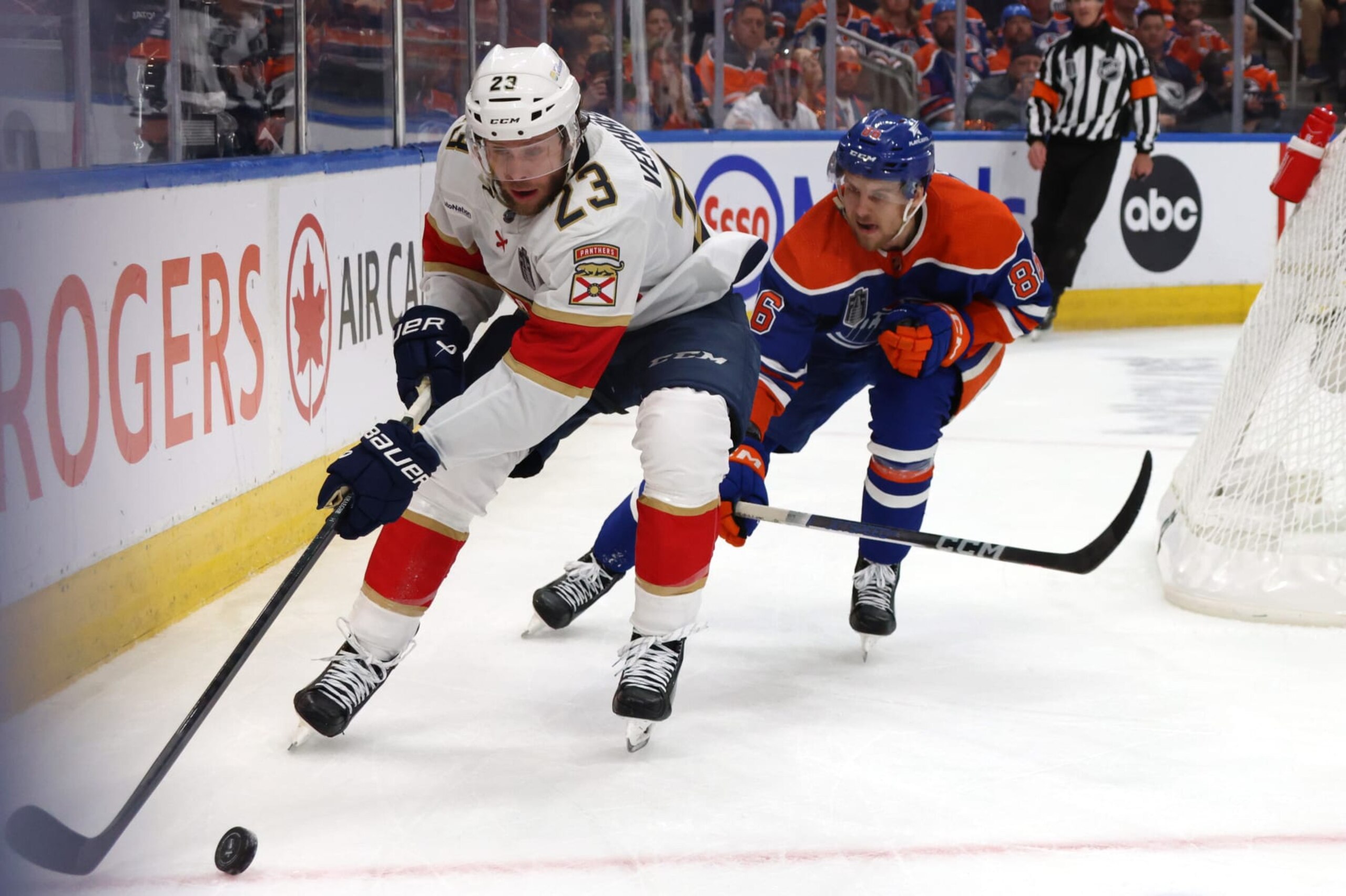 EDMONTON, ALBERTA - JUNE 13: Carter Verhaeghe #23 of the Florida Panthers is chased by Philip Broberg #86 of the Edmonton Oilers during the first period of Game Three of the 2024 Stanley Cup Final at Rogers Place on June 13, 2024 in Edmonton, Alberta. (Photo by Dave Sandford/NHLI via Getty Images) EDMONTON, ALBERTA - JUNE 13: Carter Verhaeghe #23 of the Florida Panthers is chased by Philip Broberg #86 of the Edmonton Oilers during the first period of Game Three of the 2024 Stanley Cup Final at Rogers Place on June 13, 2024 in Edmonton, Alberta. (Photo by Dave Sandford/NHLI via Getty Images)