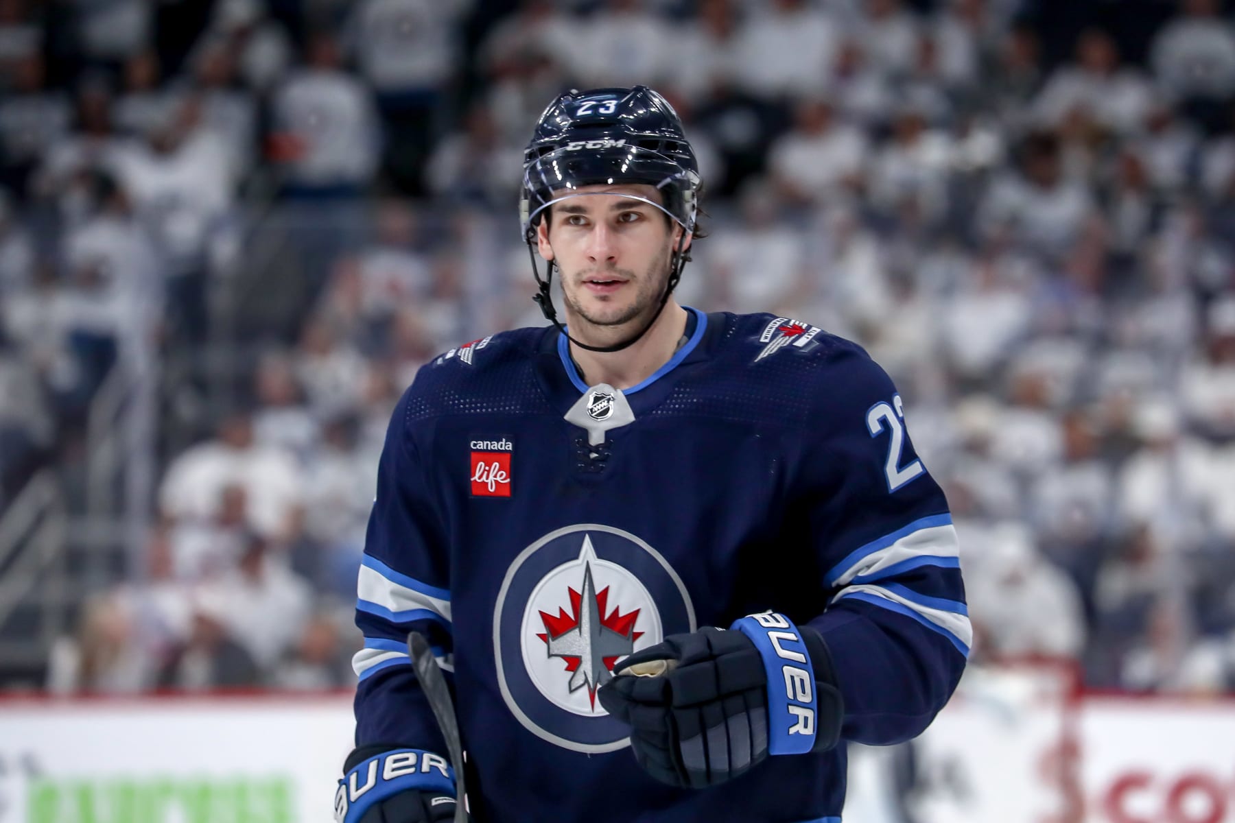 WINNIPEG, CANADA - APRIL 30: Sean Monahan #23 of the Winnipeg Jets looks on during a second period stoppage in play against the Colorado Avalanche in Game Five of the First Round of the 2024 Stanley Cup Playoffs at the Canada Life Centre on April 30, 2024 in Winnipeg, Manitoba, Canada. The Avs defeated the Jets 6-3 and win the series 4-1. (Photo by Darcy Finley/NHLI via Getty Images)