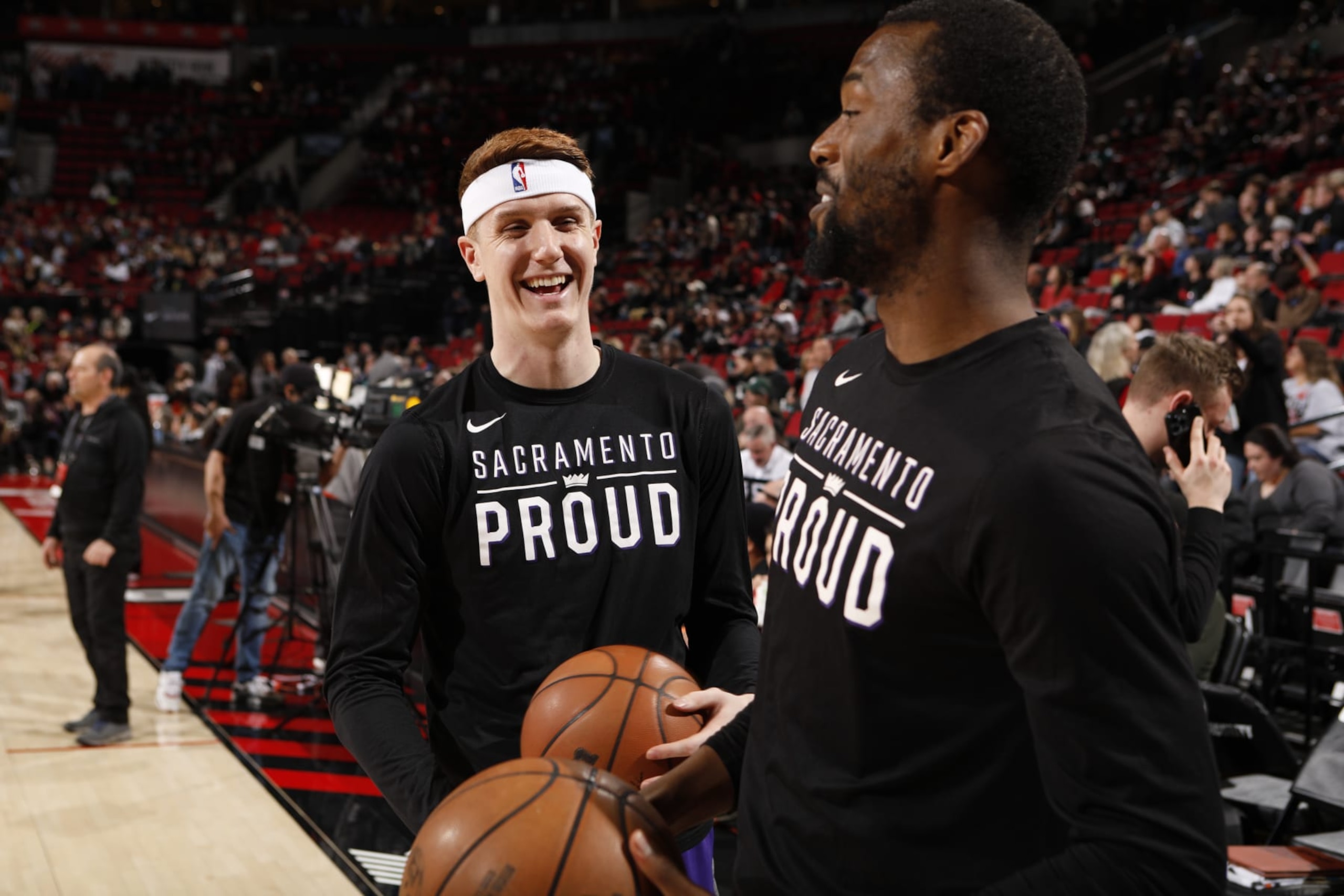 PORTLAND, OR - MARCH 31: Kevin Huerter #9 of the Sacramento Kings and Harrison Barnes #40 warm up before the game against the Portland Trail Blazers on March 31, 2023 at the Moda Center Arena in Portland, Oregon. NOTE TO USER: User expressly acknowledges and agrees that, by downloading and or using this photograph, user is consenting to the terms and conditions of the Getty Images License Agreement. Mandatory Copyright Notice: Copyright 2023 NBAE (Photo by Cameron Browne/NBAE via Getty Images)