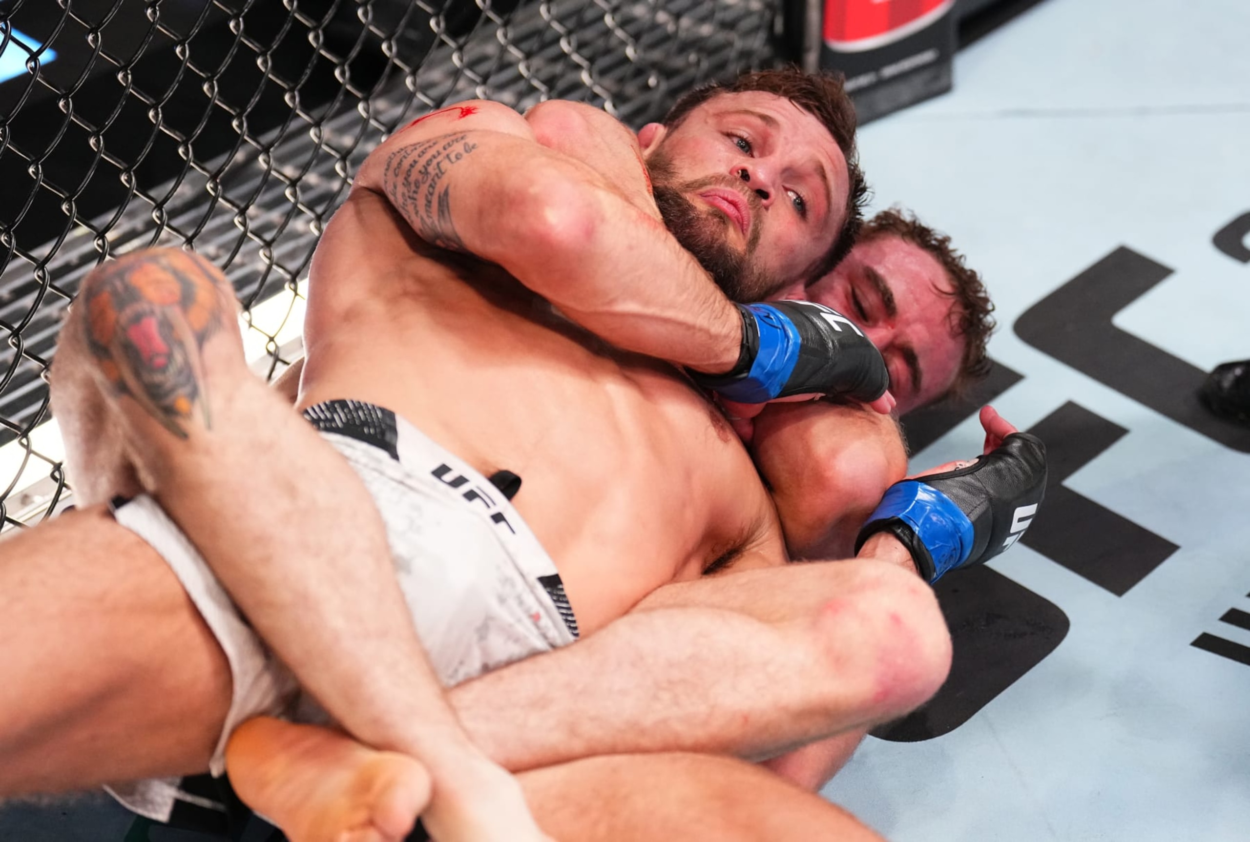 LAS VEGAS, NEVADA - JUNE 15: (R-L) Brady Hiestand secures a rear choke submission against Garrett Armfield in a bantamweight fight during the UFC Fight Night event at UFC APEX on June 15, 2024 in Las Vegas, Nevada.  (Photo by Chris Unger/Zuffa LLC via Getty Images)