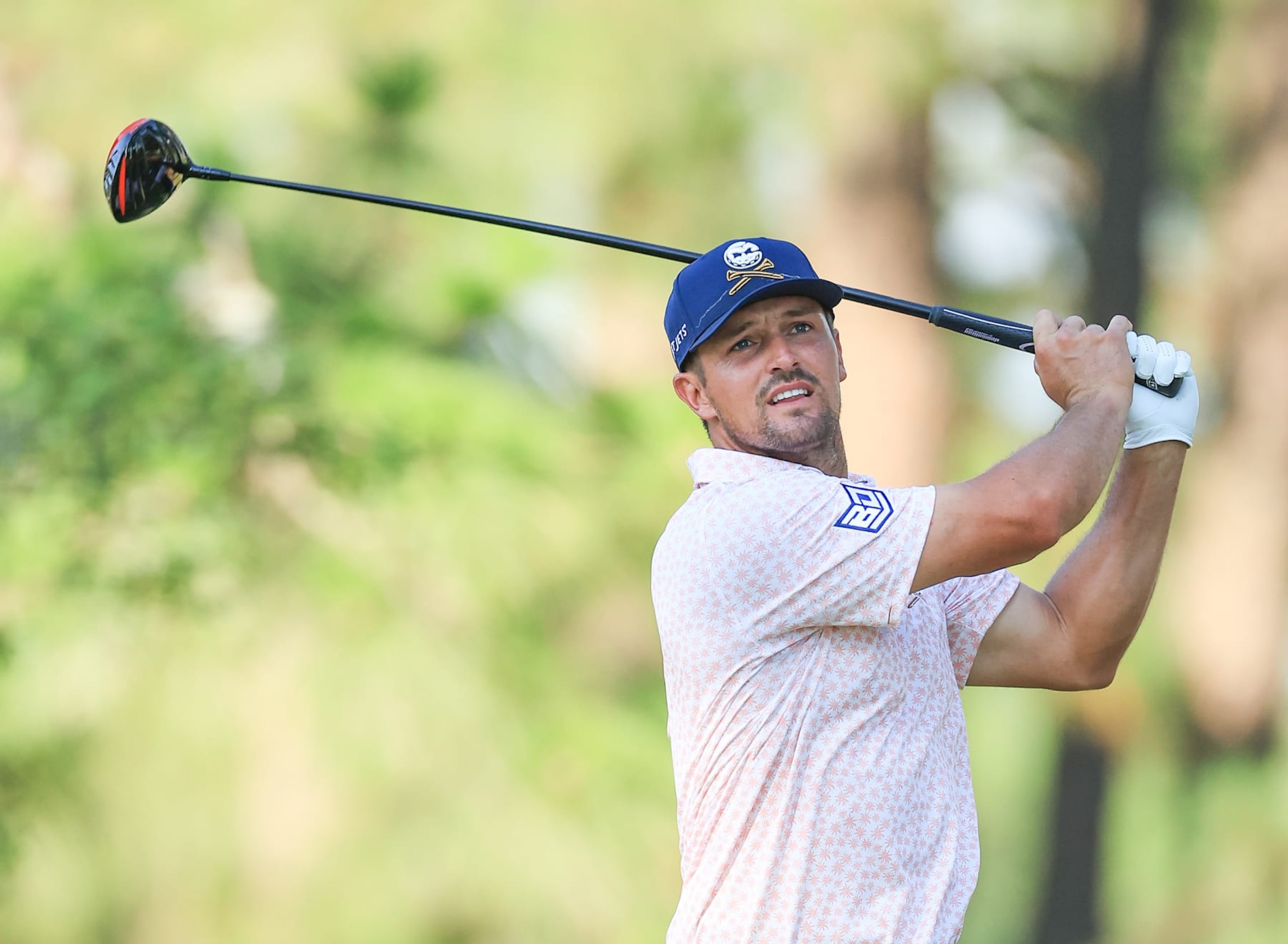 PINEHURST, NORTH CAROLINA - JUNE 15: Bryson DeChambeau of The United States plays his tee shot on the 11th hole during the third round of the 2024 U.S. Open on the No.2 Course at The Pinehurst Resort on June 15, 2024 in Pinehurst, North Carolina. (Photo by David Cannon/Getty Images) PINEHURST, NORTH CAROLINA - JUNE 15: Bryson DeChambeau of The United States plays his tee shot on the 11th hole during the third round of the 2024 U.S. Open on the No.2 Course at The Pinehurst Resort on June 15, 2024 in Pinehurst, North Carolina. (Photo by David Cannon/Getty Images)