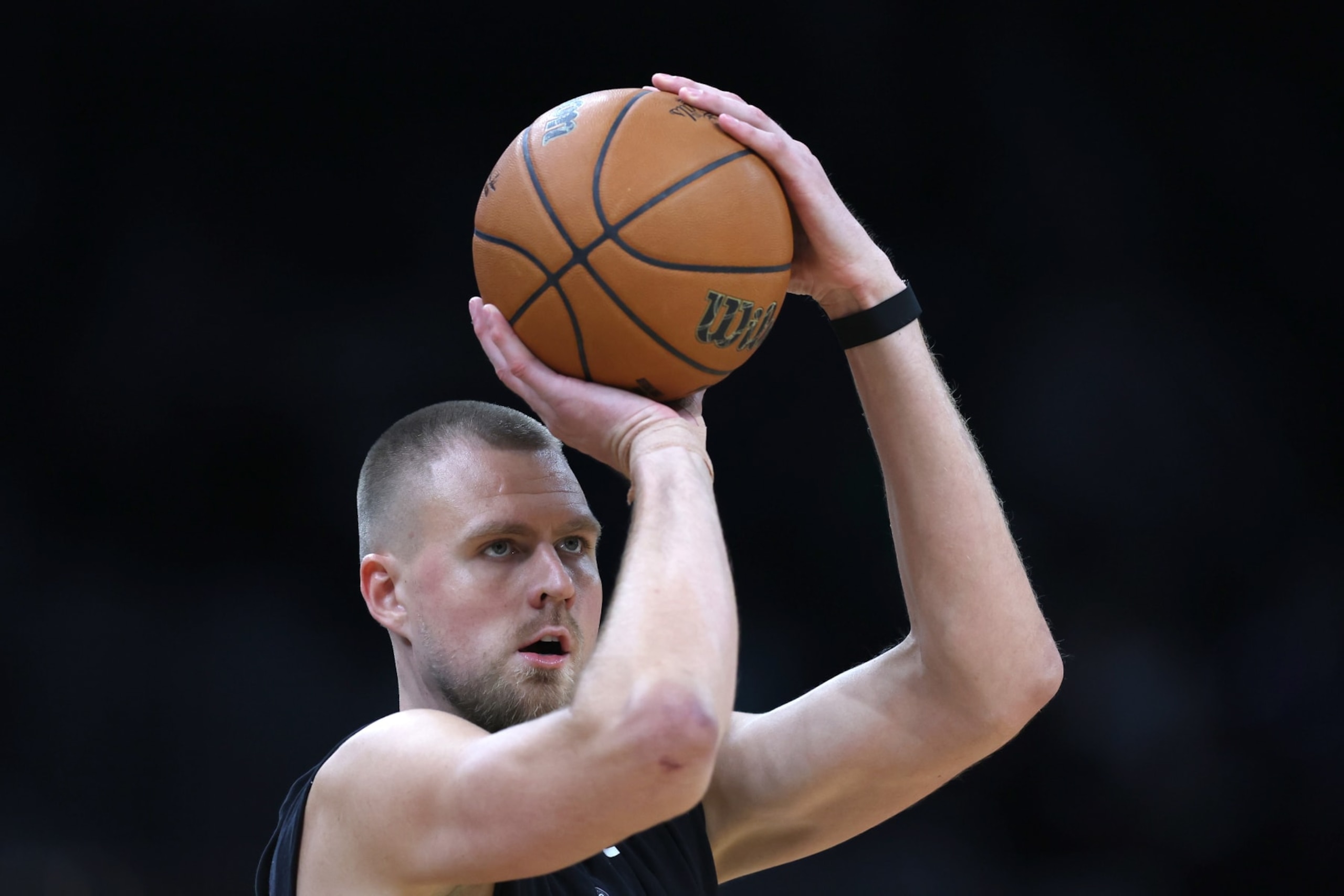 BOSTON, MASSACHUSETTS - JUNE 09: Kristaps Porzingis #8 of the Boston Celtics warms up on prior to Game Two of the 2024 NBA Finals against the Dallas Mavericks at TD Garden on June 09, 2024 in Boston, Massachusetts. NOTE TO USER: User expressly acknowledges and agrees that, by downloading and or using this photograph, User is consenting to the terms and conditions of the Getty Images License Agreement. (Photo by Adam Glanzman/Getty Images) BOSTON, MASSACHUSETTS - JUNE 09: Kristaps Porzingis #8 of the Boston Celtics warms up on prior to Game Two of the 2024 NBA Finals against the Dallas Mavericks at TD Garden on June 09, 2024 in Boston, Massachusetts. NOTE TO USER: User expressly acknowledges and agrees that, by downloading and or using this photograph, User is consenting to the terms and conditions of the Getty Images License Agreement. (Photo by Adam Glanzman/Getty Images)
